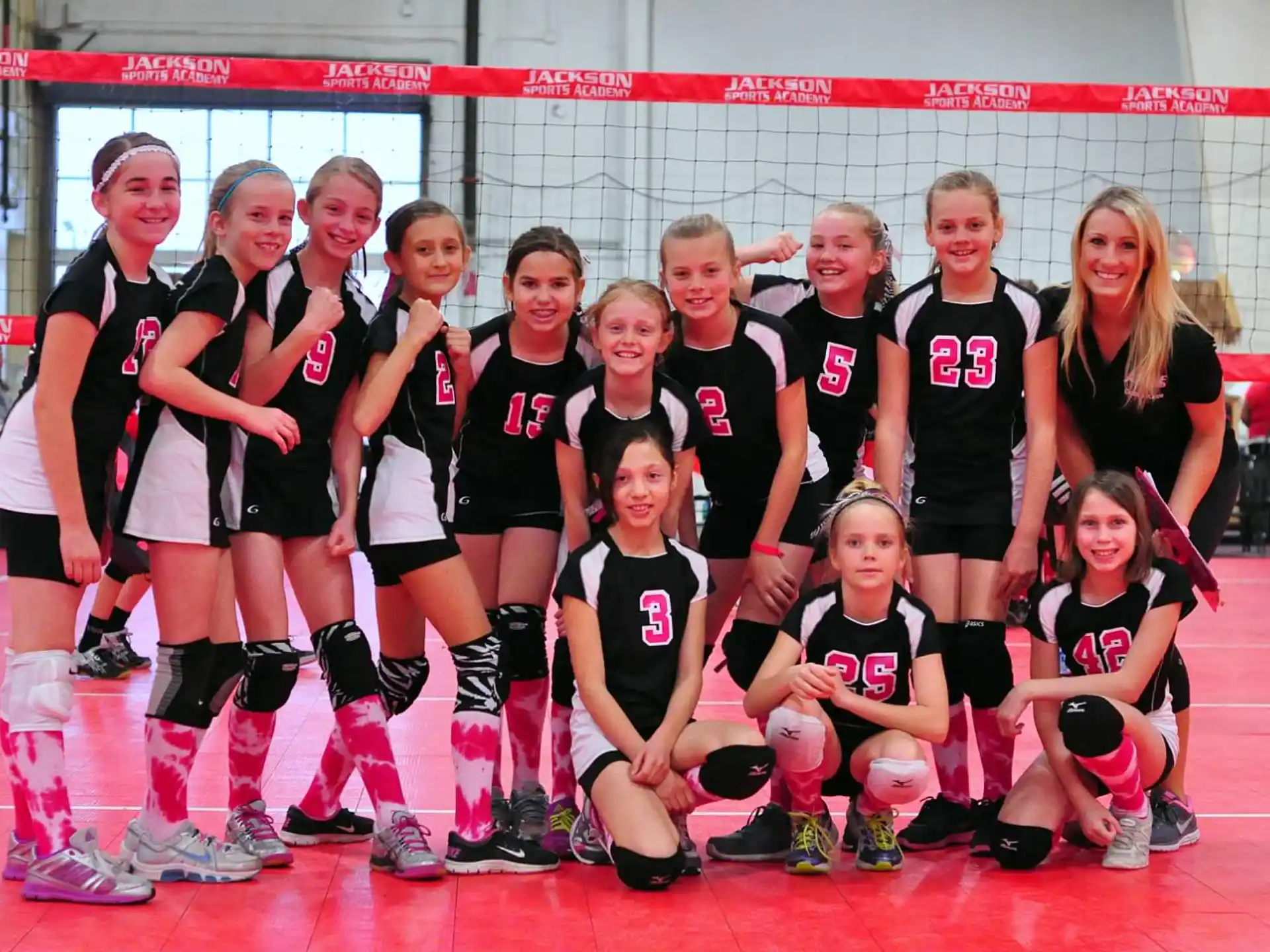 a group of girls in a gym