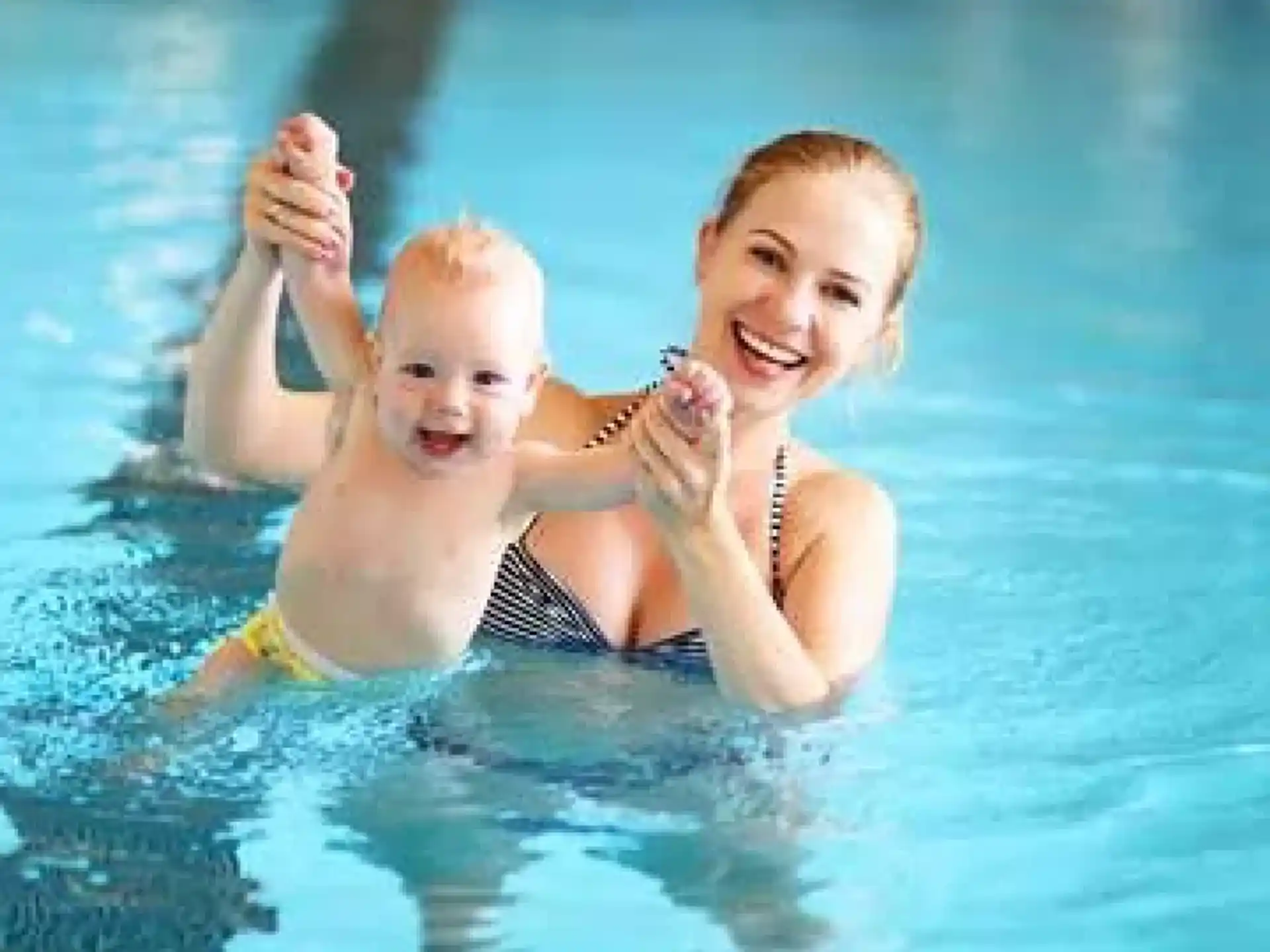 a person and a child in the water