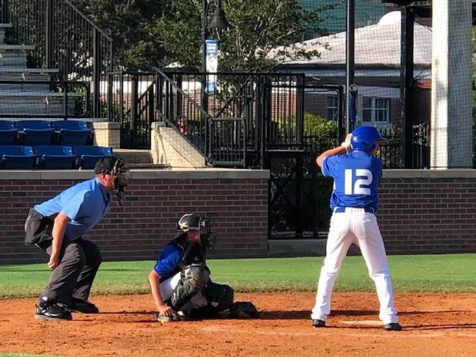 a baseball player up to bat at a baseball game