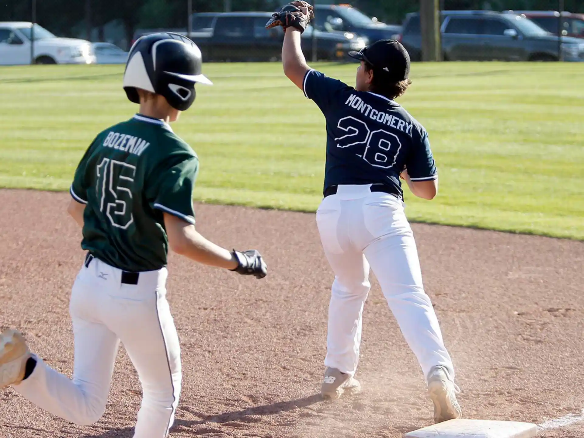 a couple of baseball players playing baseball