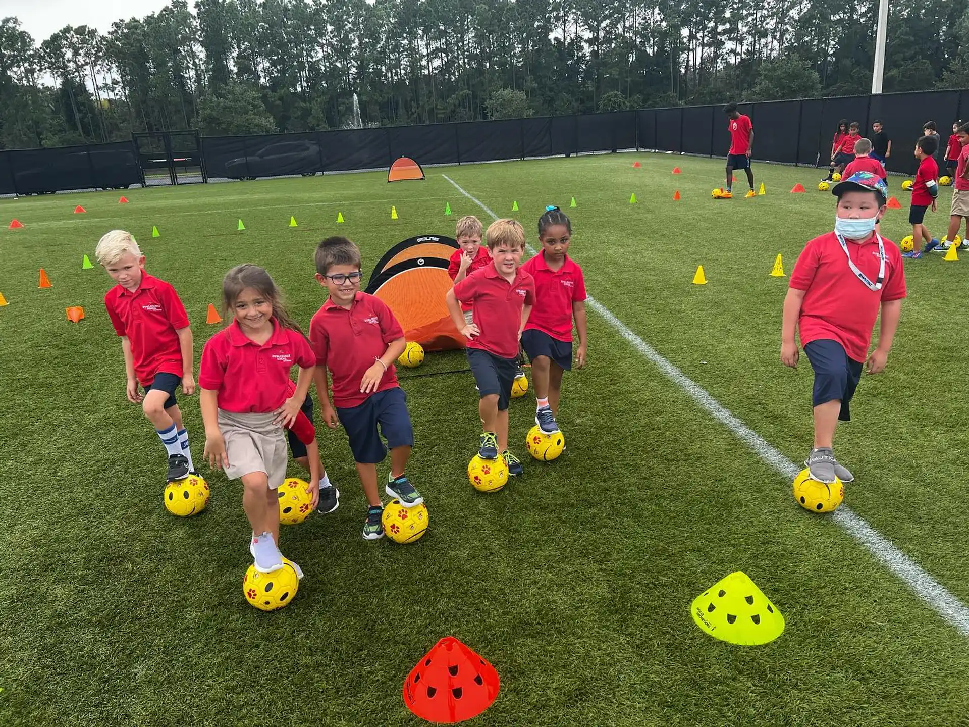 kids playing football on a field