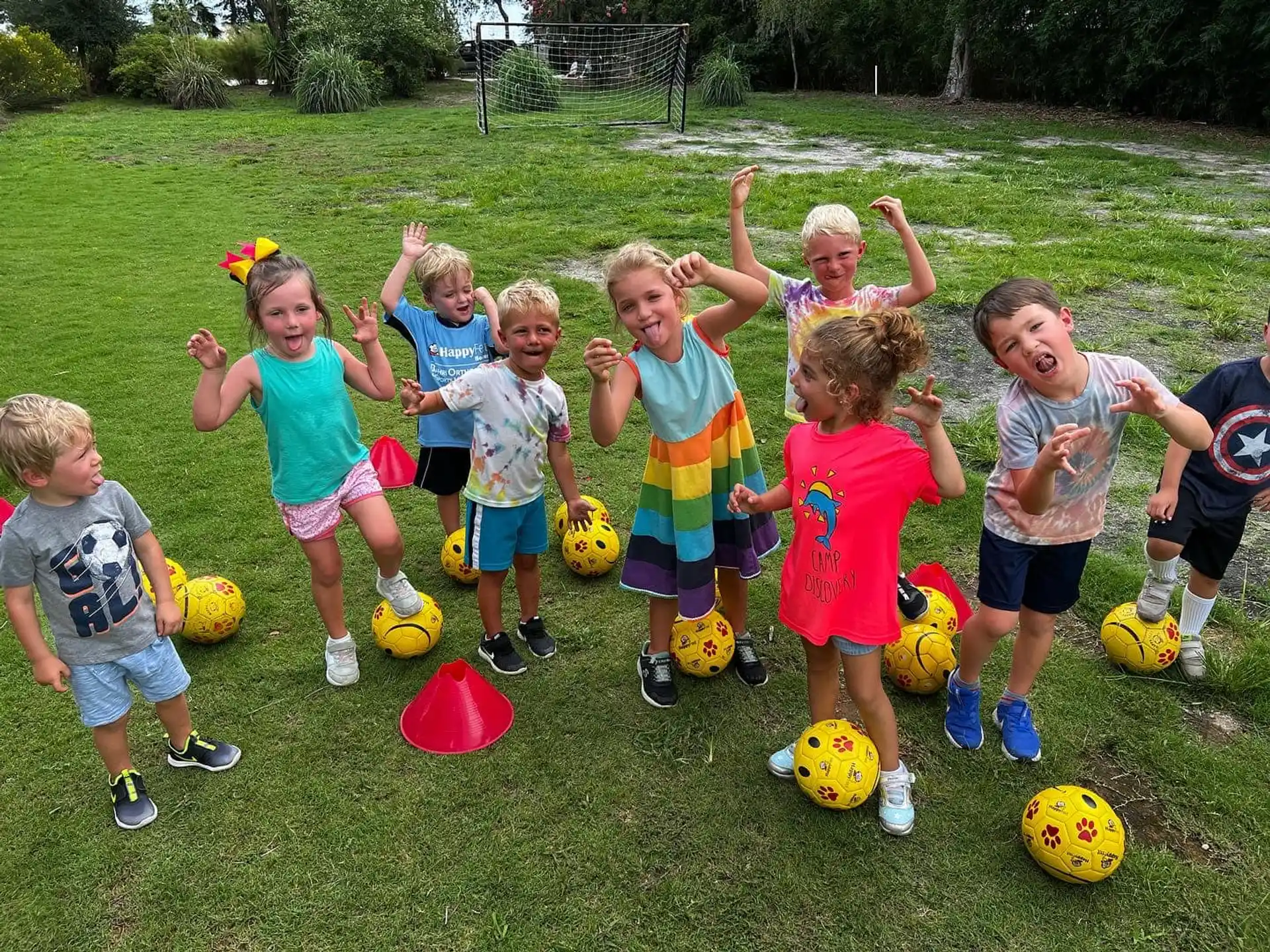 kids playing with football balls