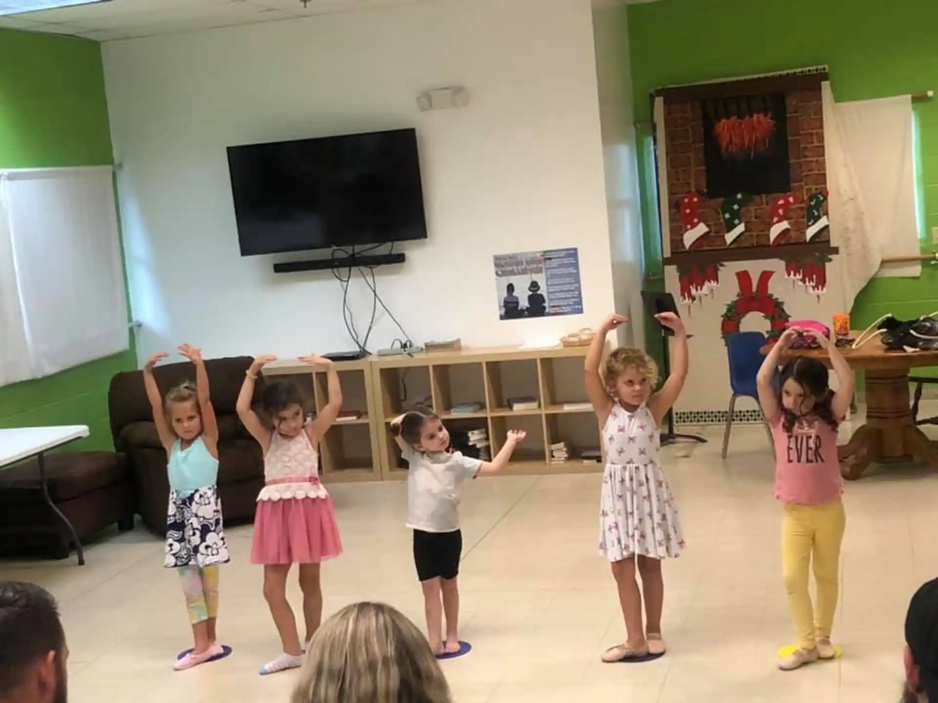 a group of children in a classroom