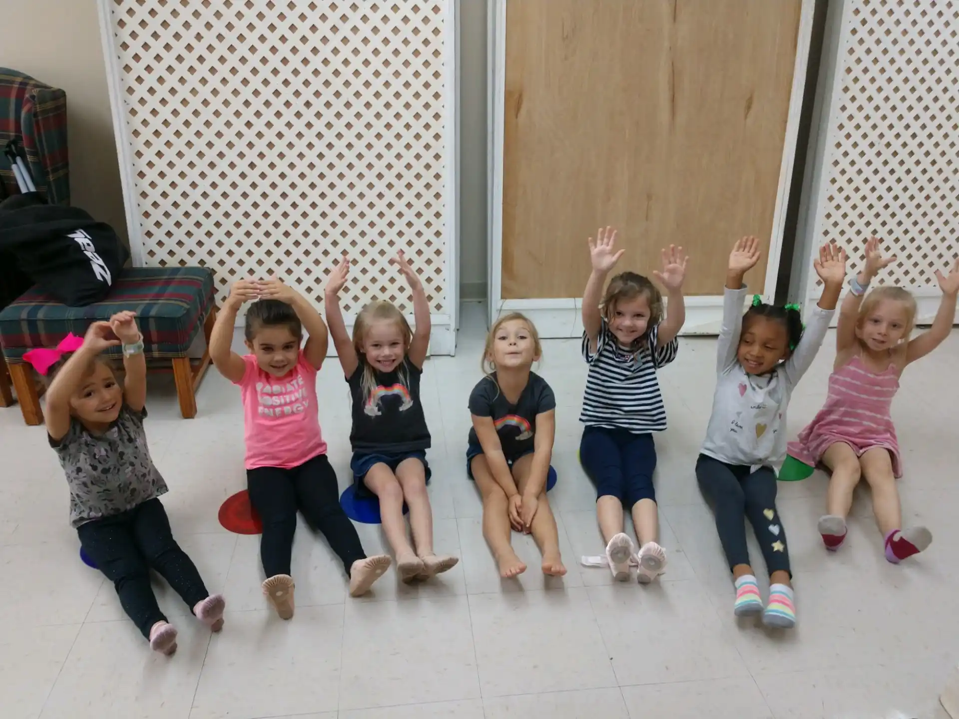 a group of children posing for a photo