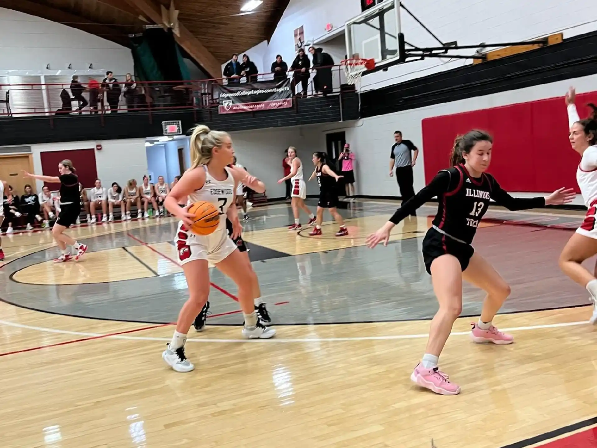 a group of women playing basketball