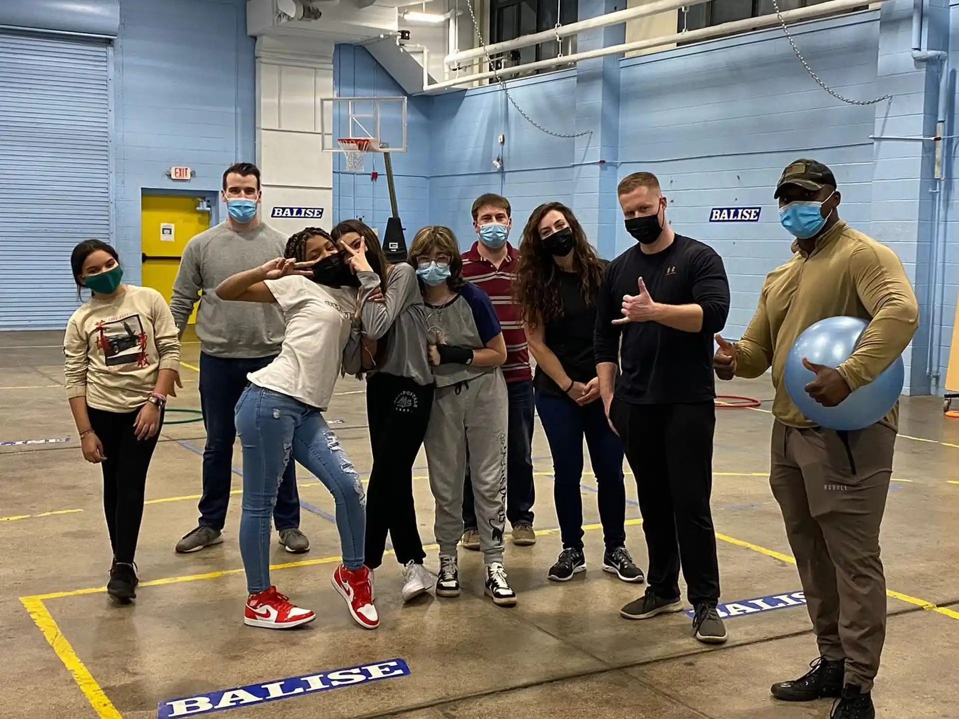 a group of people posing for a photo