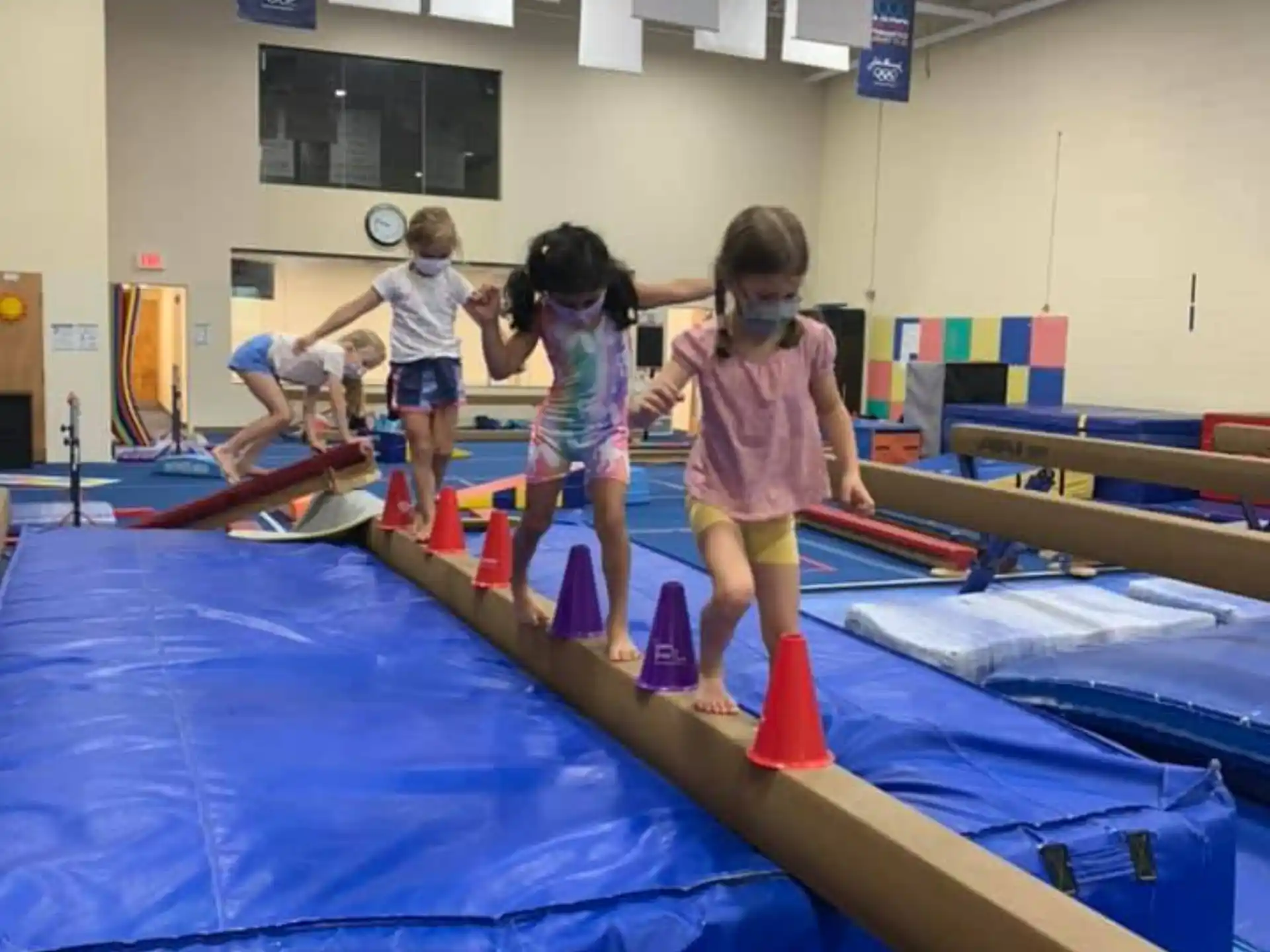 children playing on a trampoline