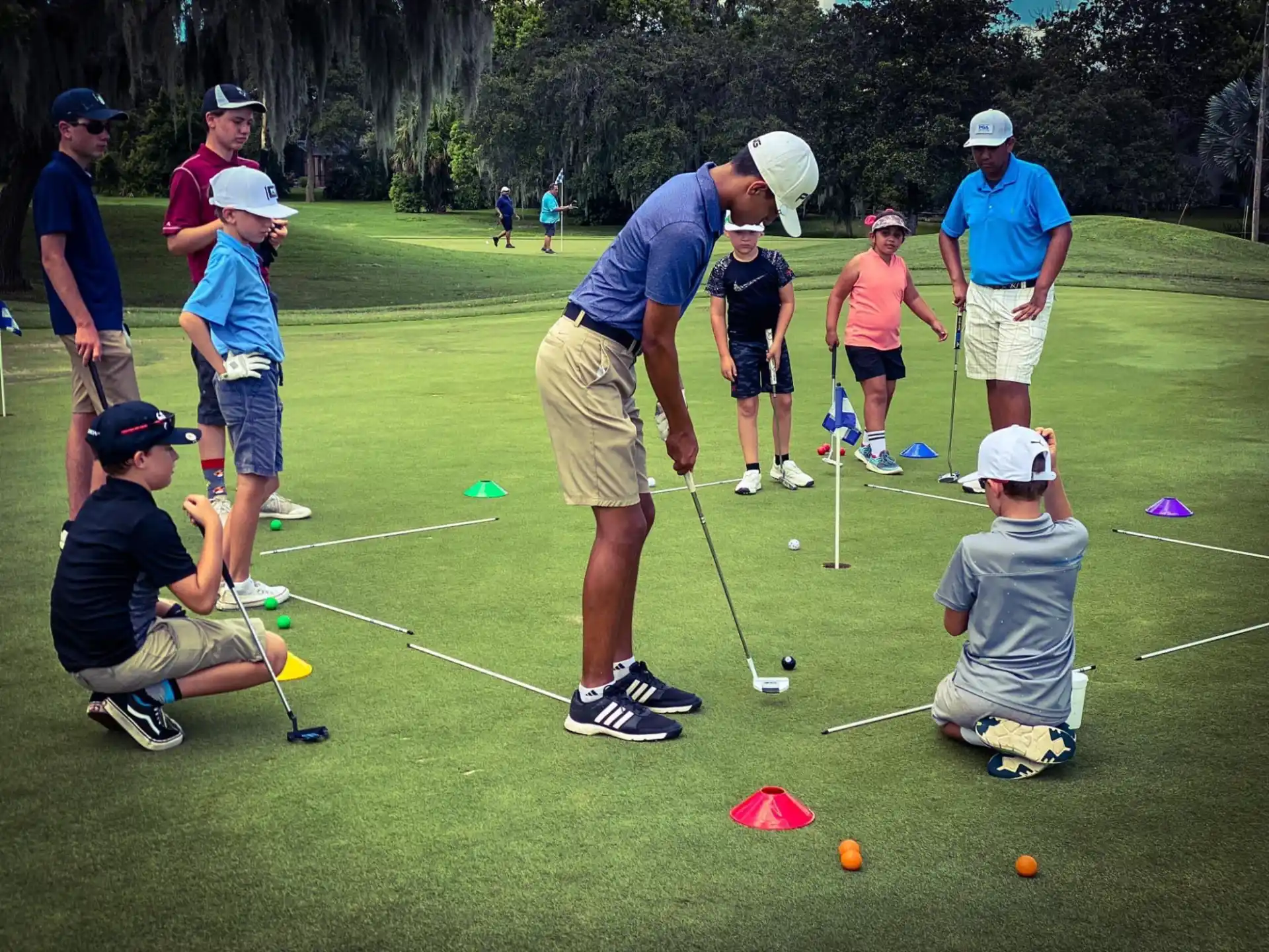 a group of people playing golf