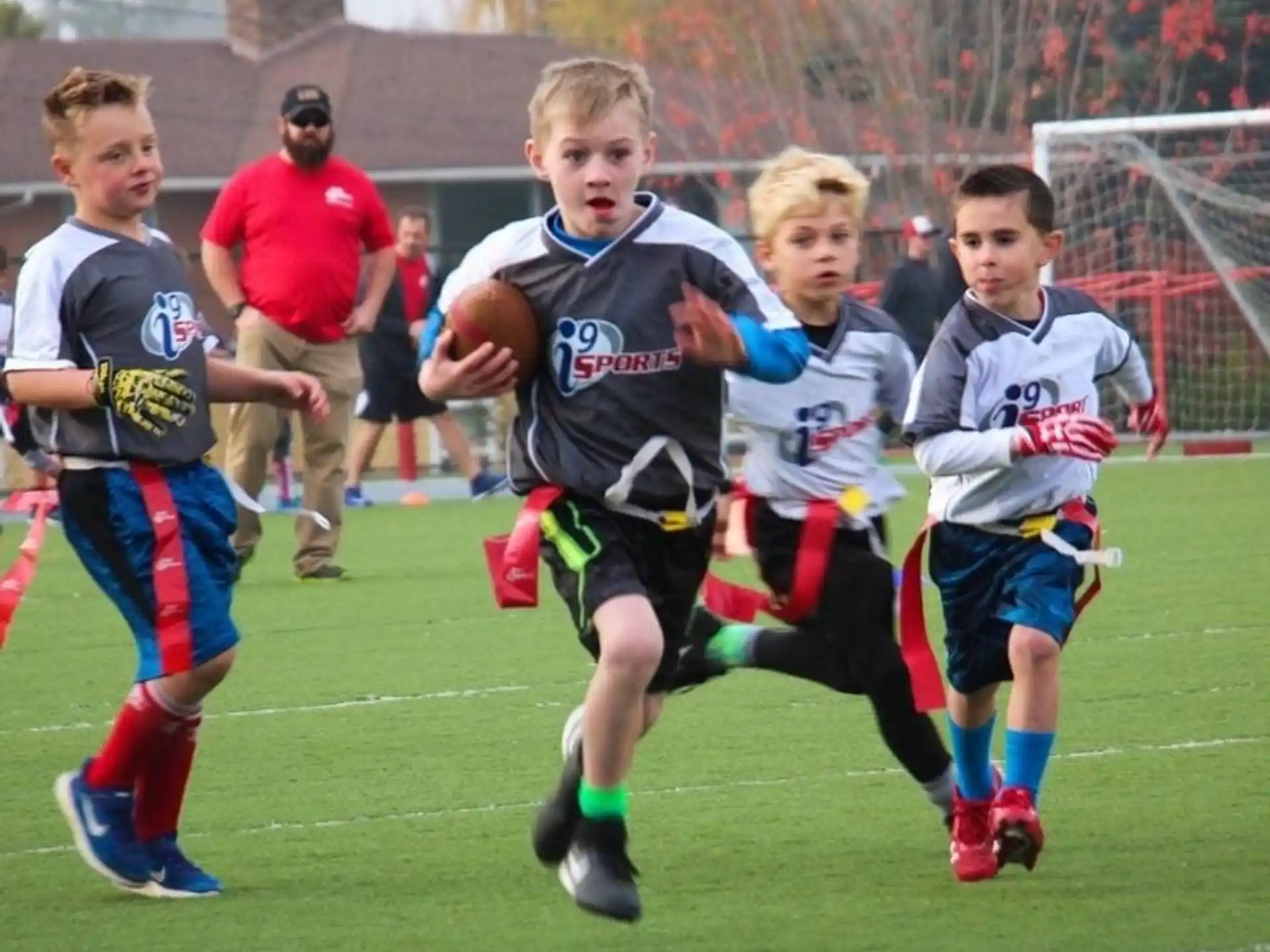 a group of kids playing football