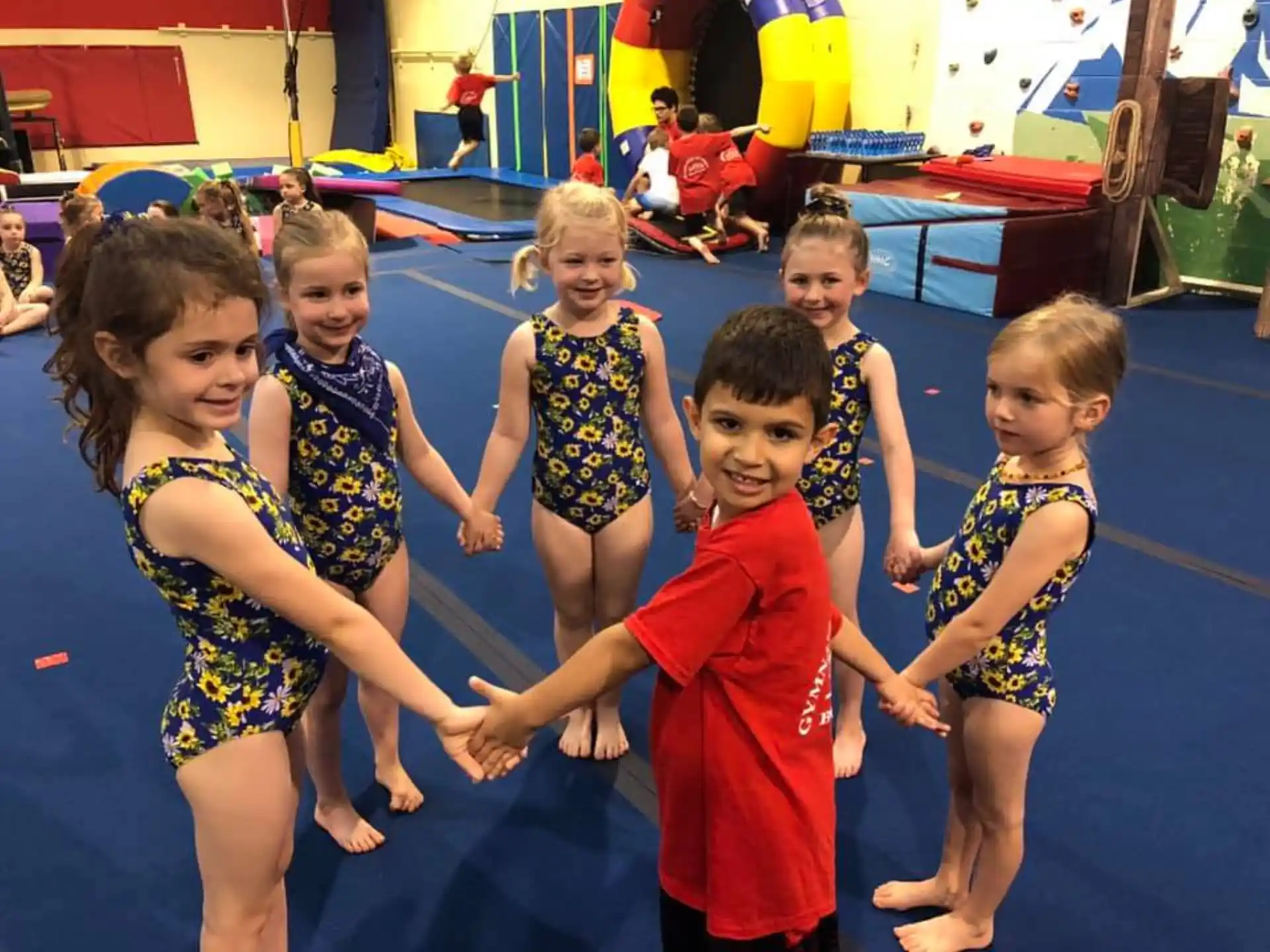 a group of children in a pool