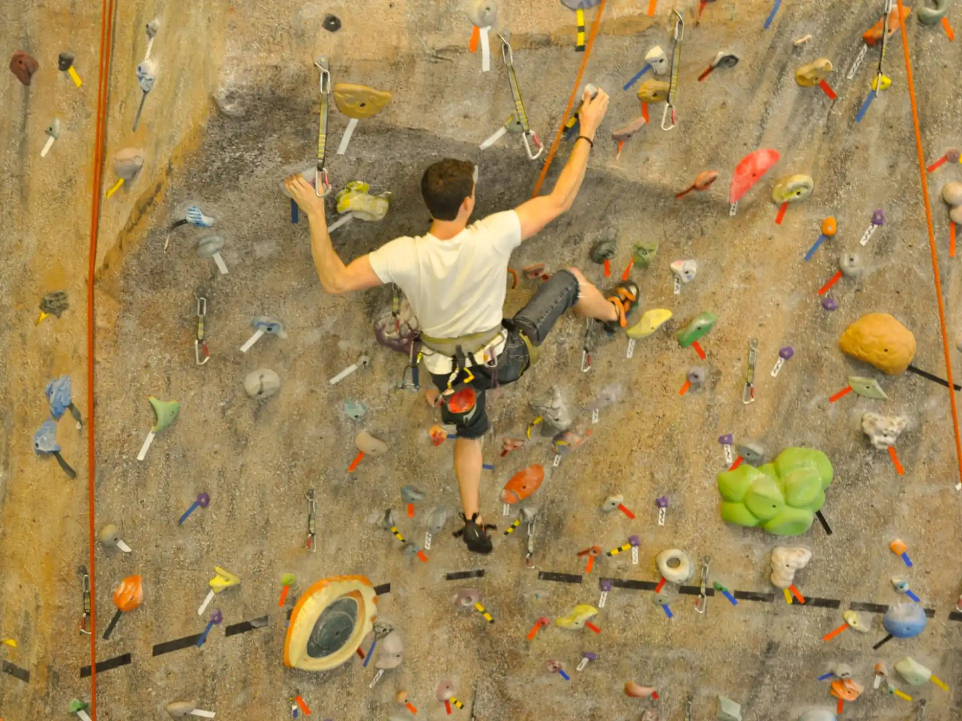 a person climbing a rock wall