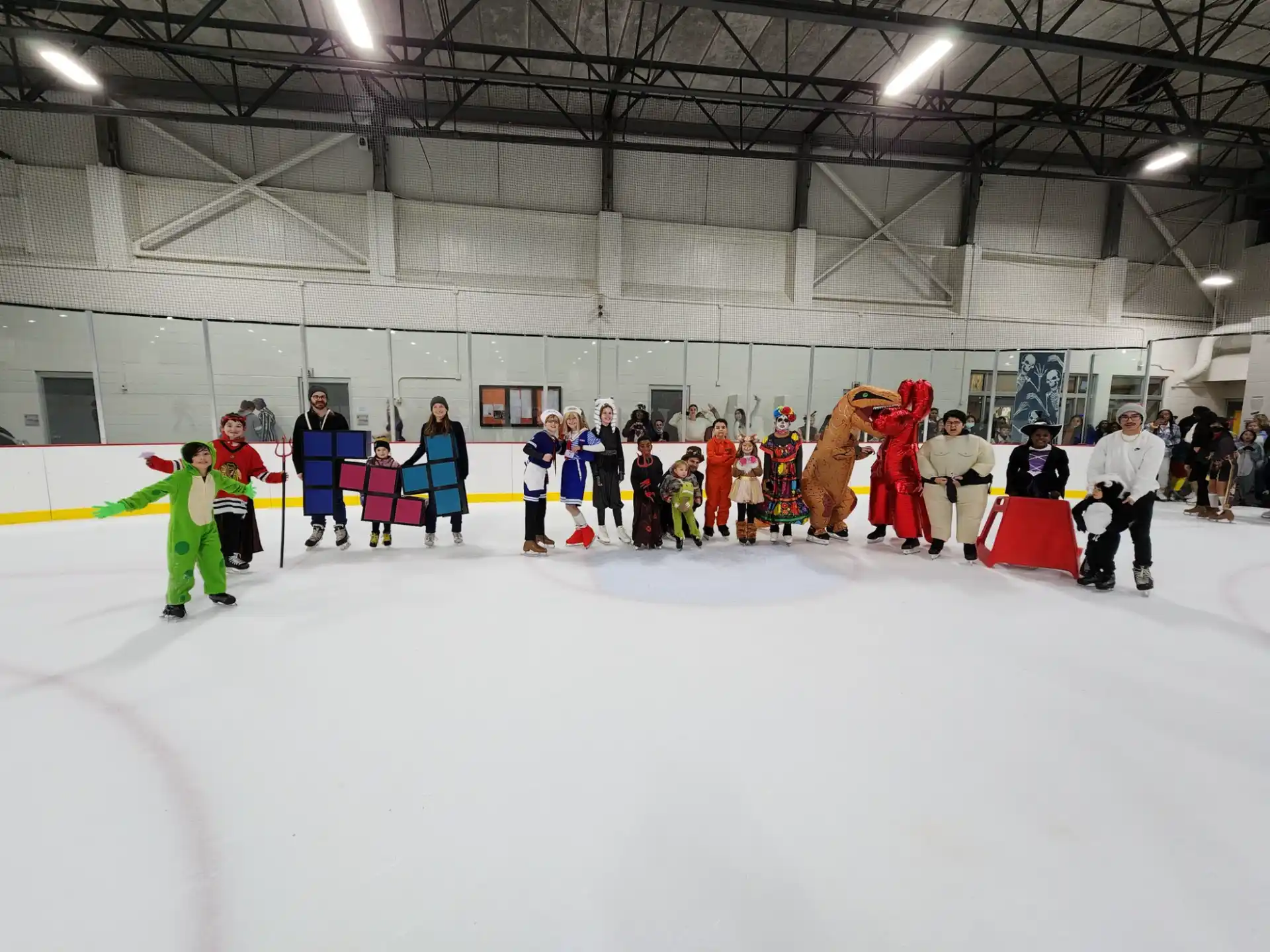 a group of people in a rink