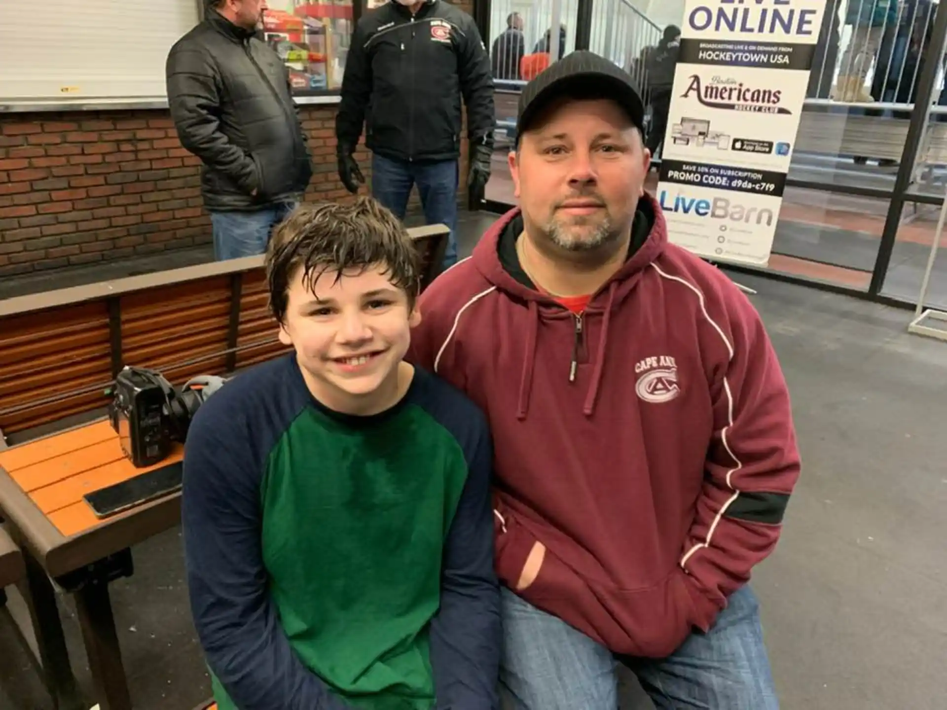 a man and a boy posing for a picture