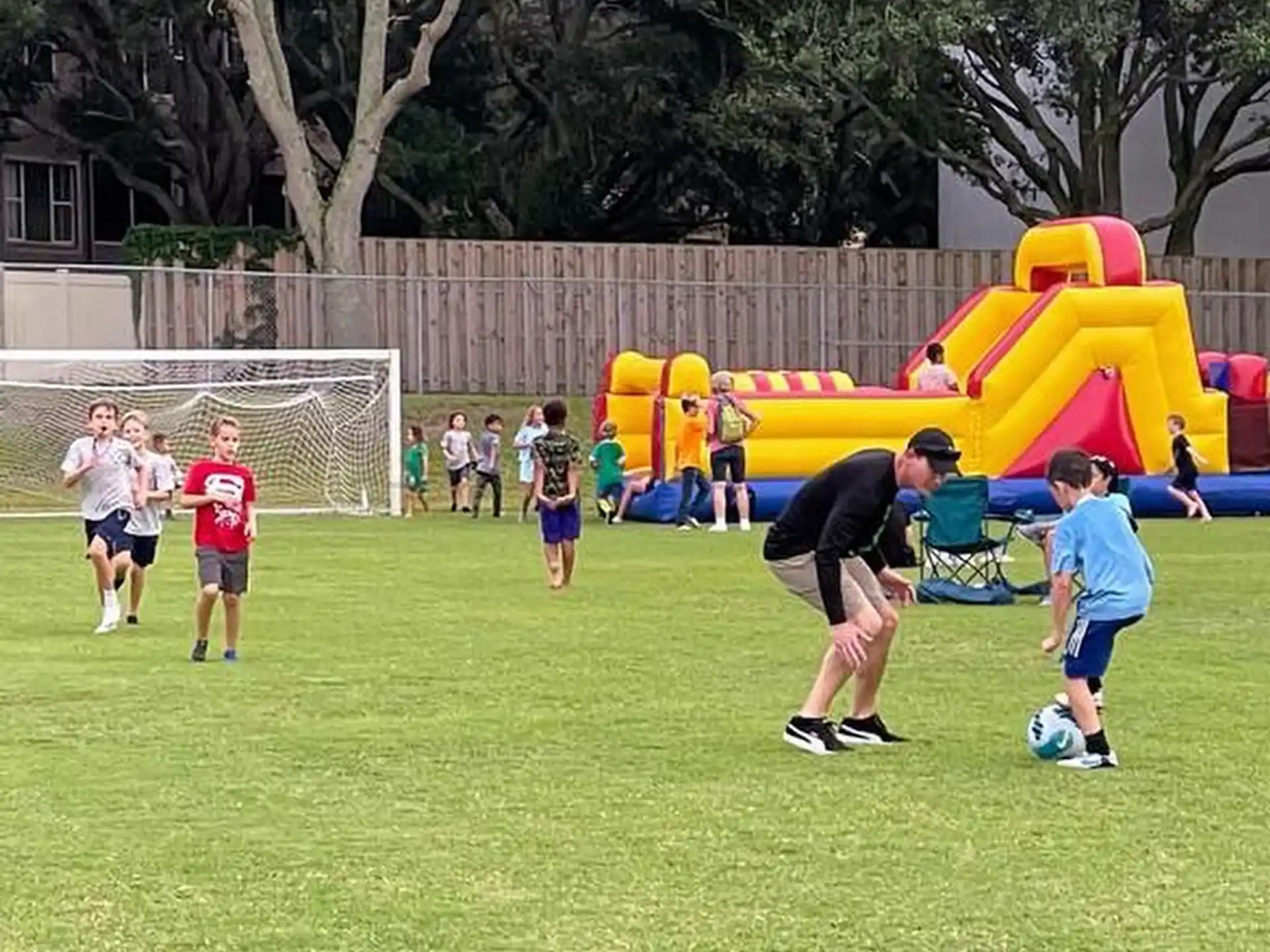 a group of kids playing football