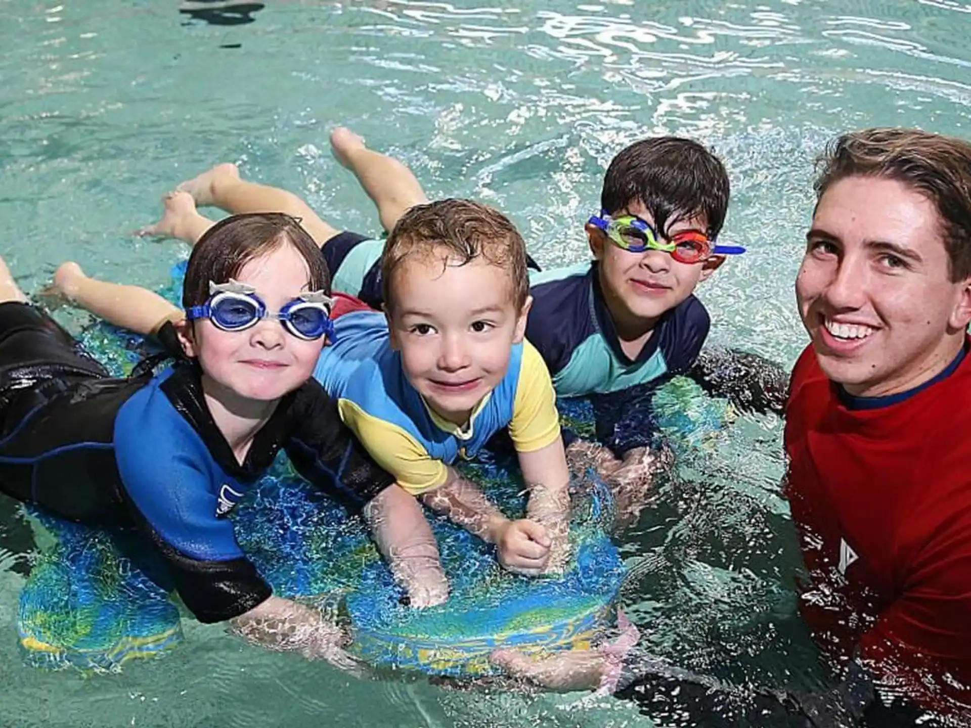 a group of people in a pool