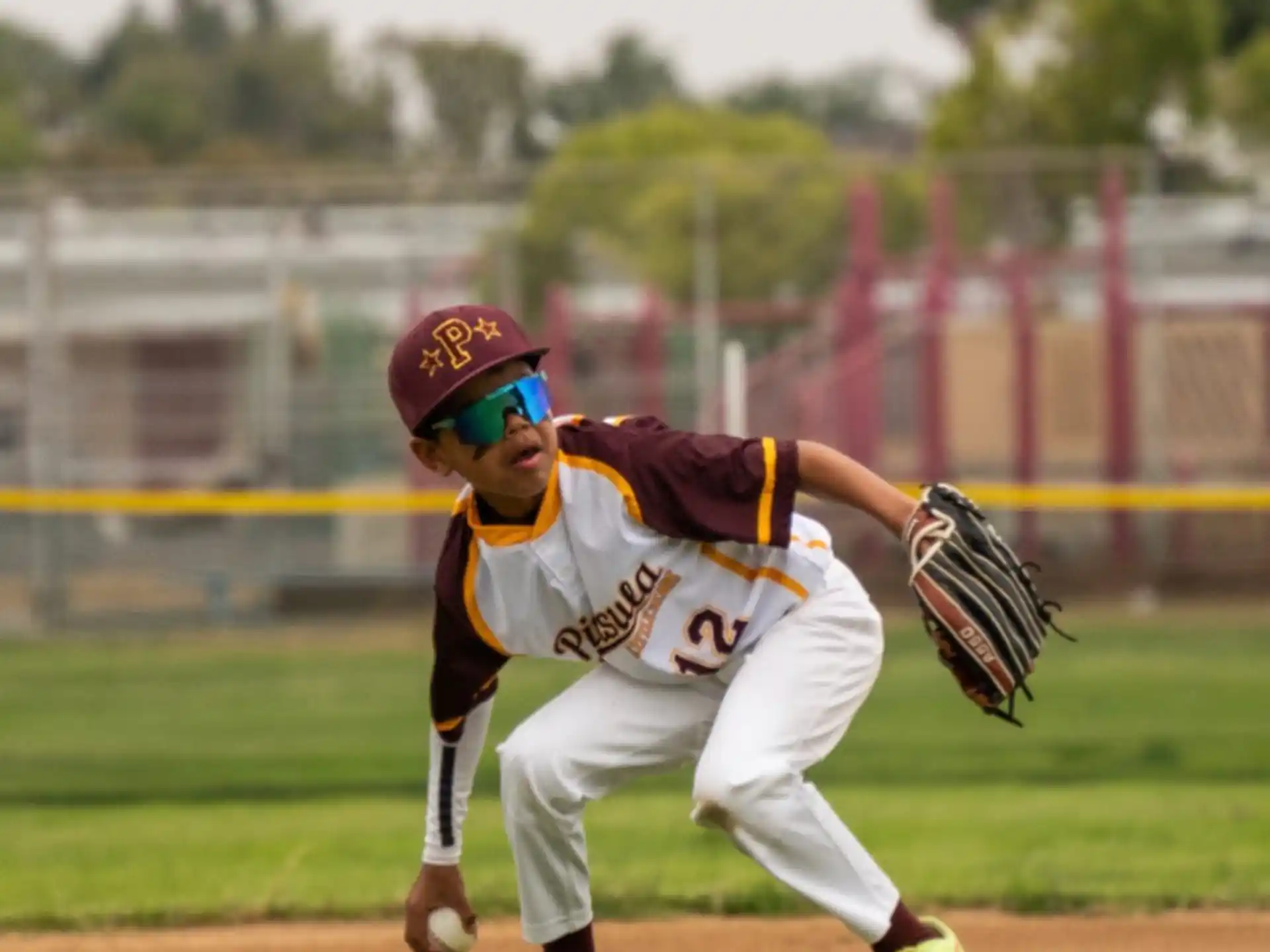 a baseball player catching a ball