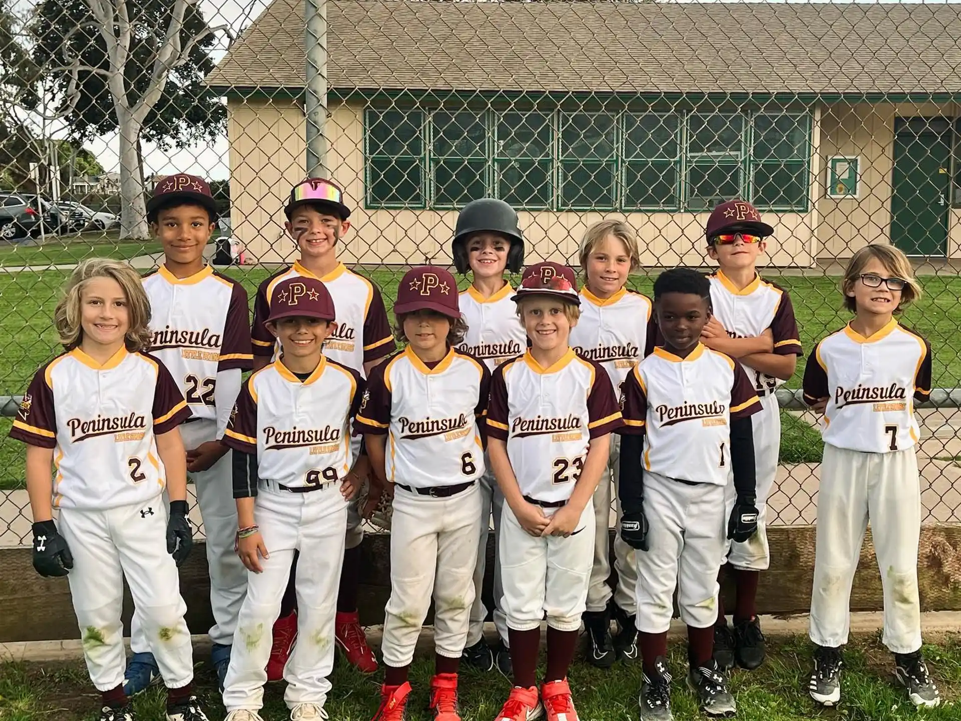 a group of kids posing for a photo
