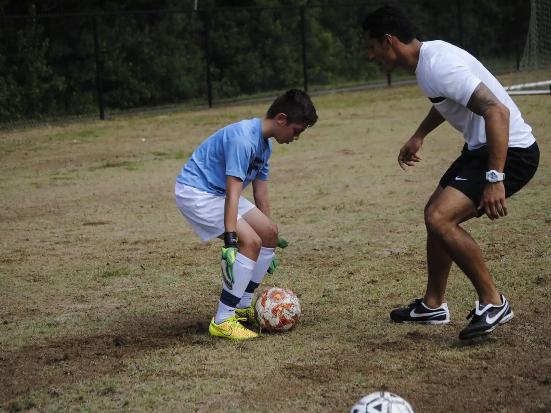 a couple of men playing football