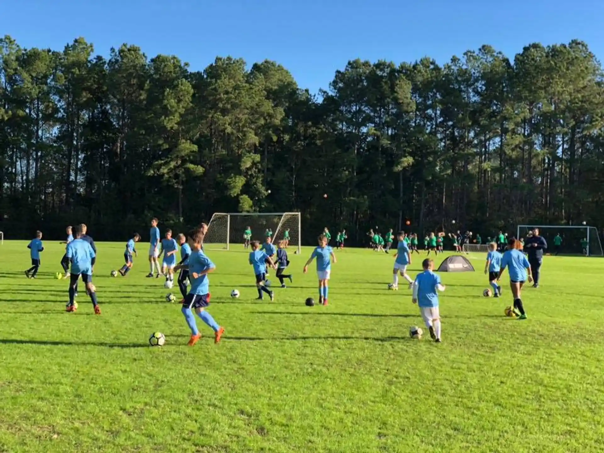 a group of people playing football