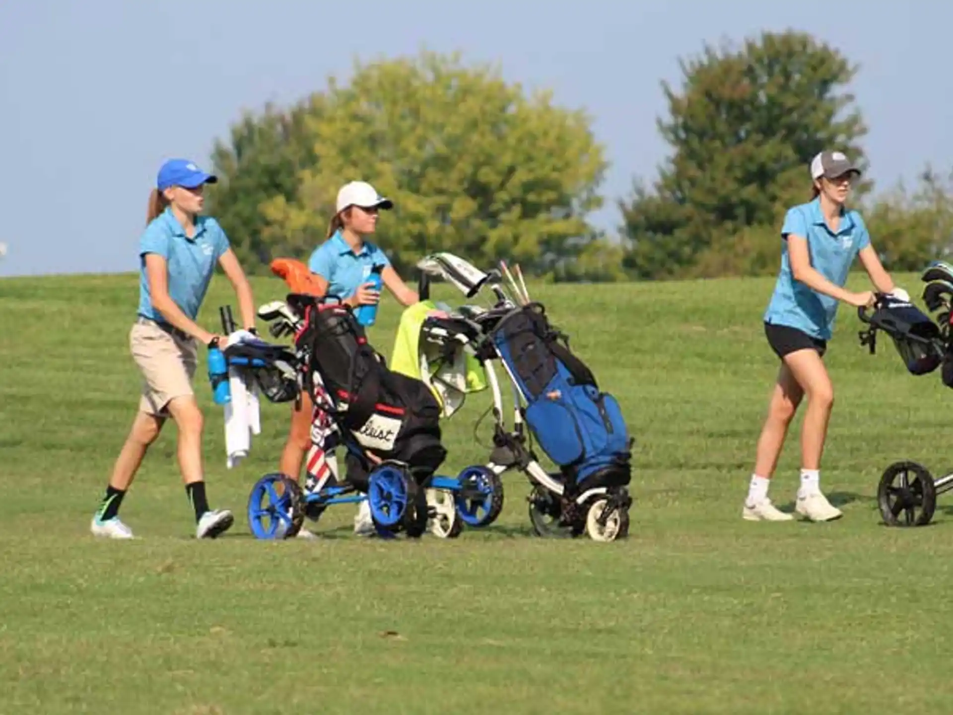 a group of people playing golf