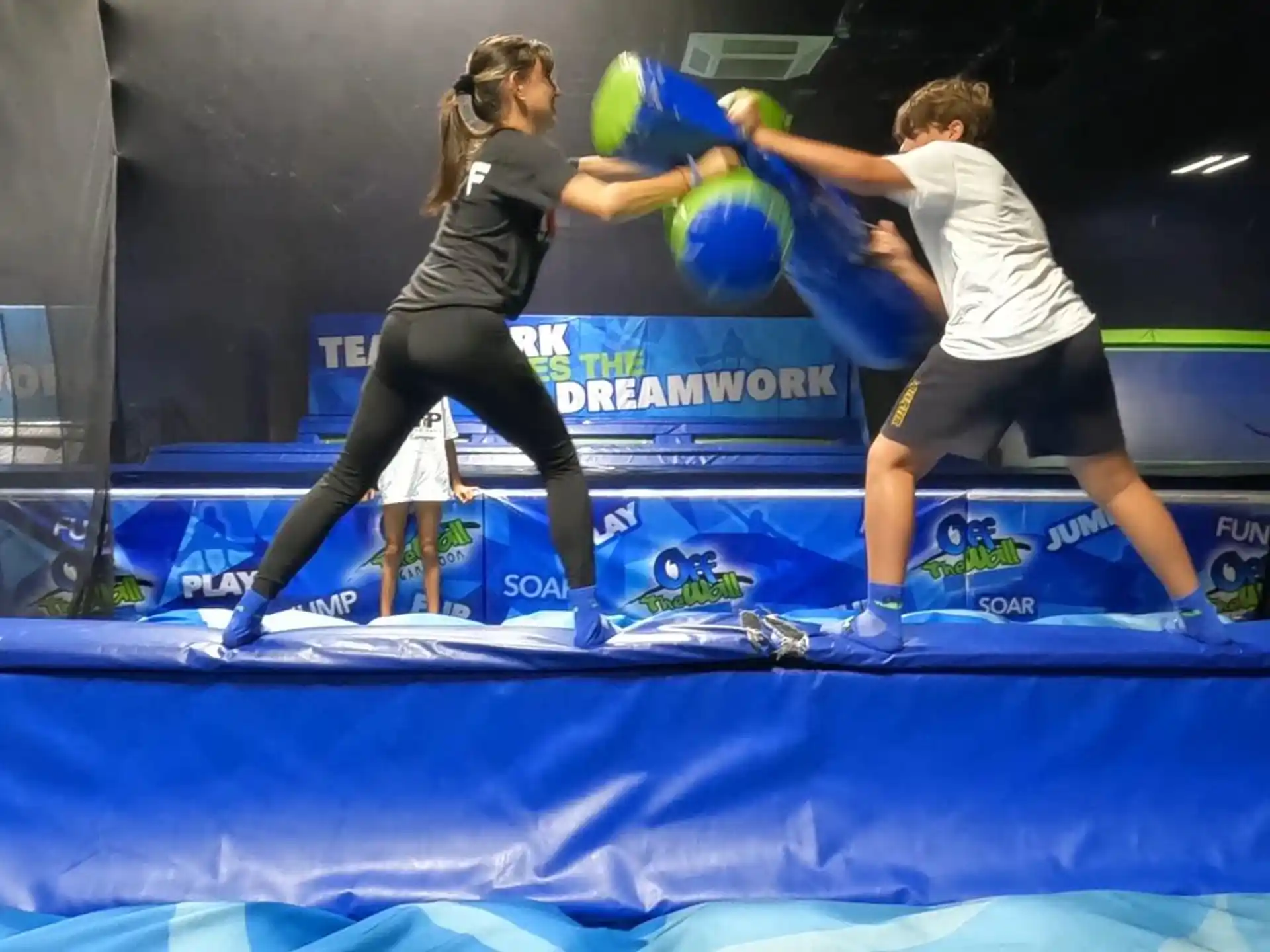 a man and woman boxing