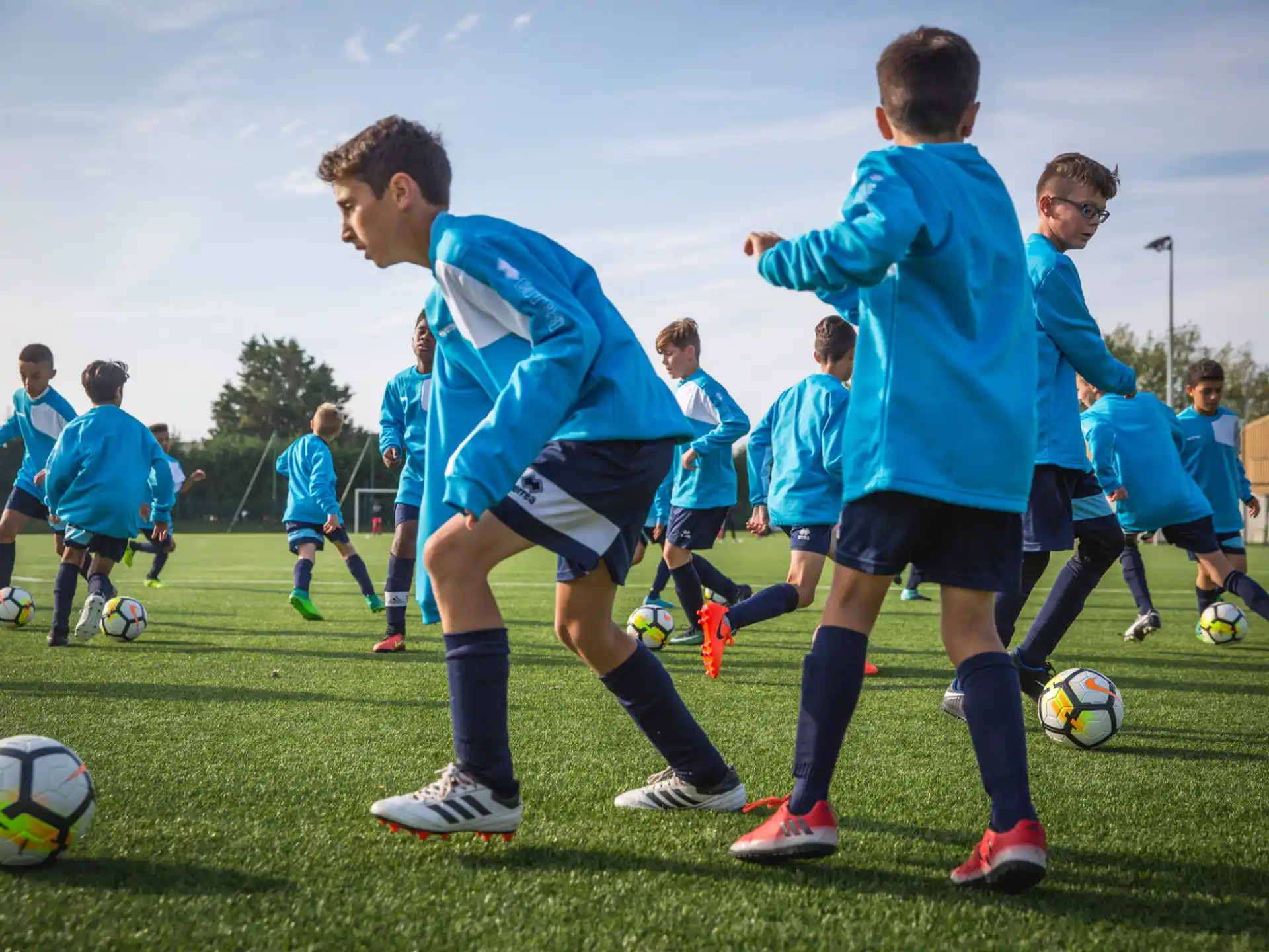 a group of kids playing football
