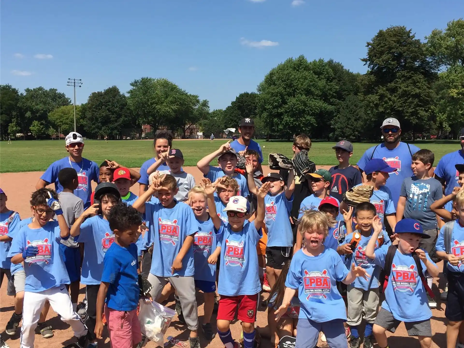 a group of kids posing for a photo