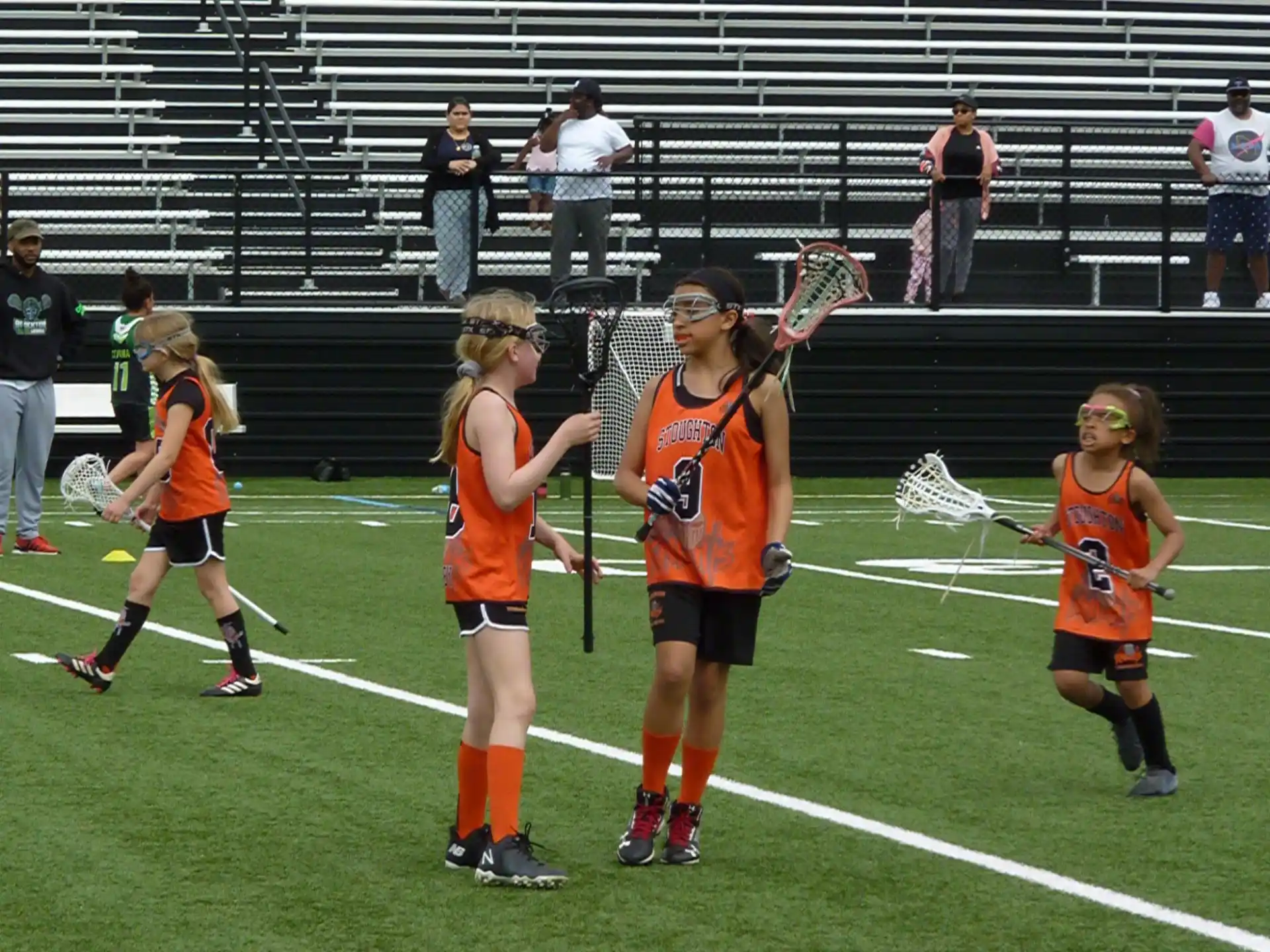 a group of women playing a sport