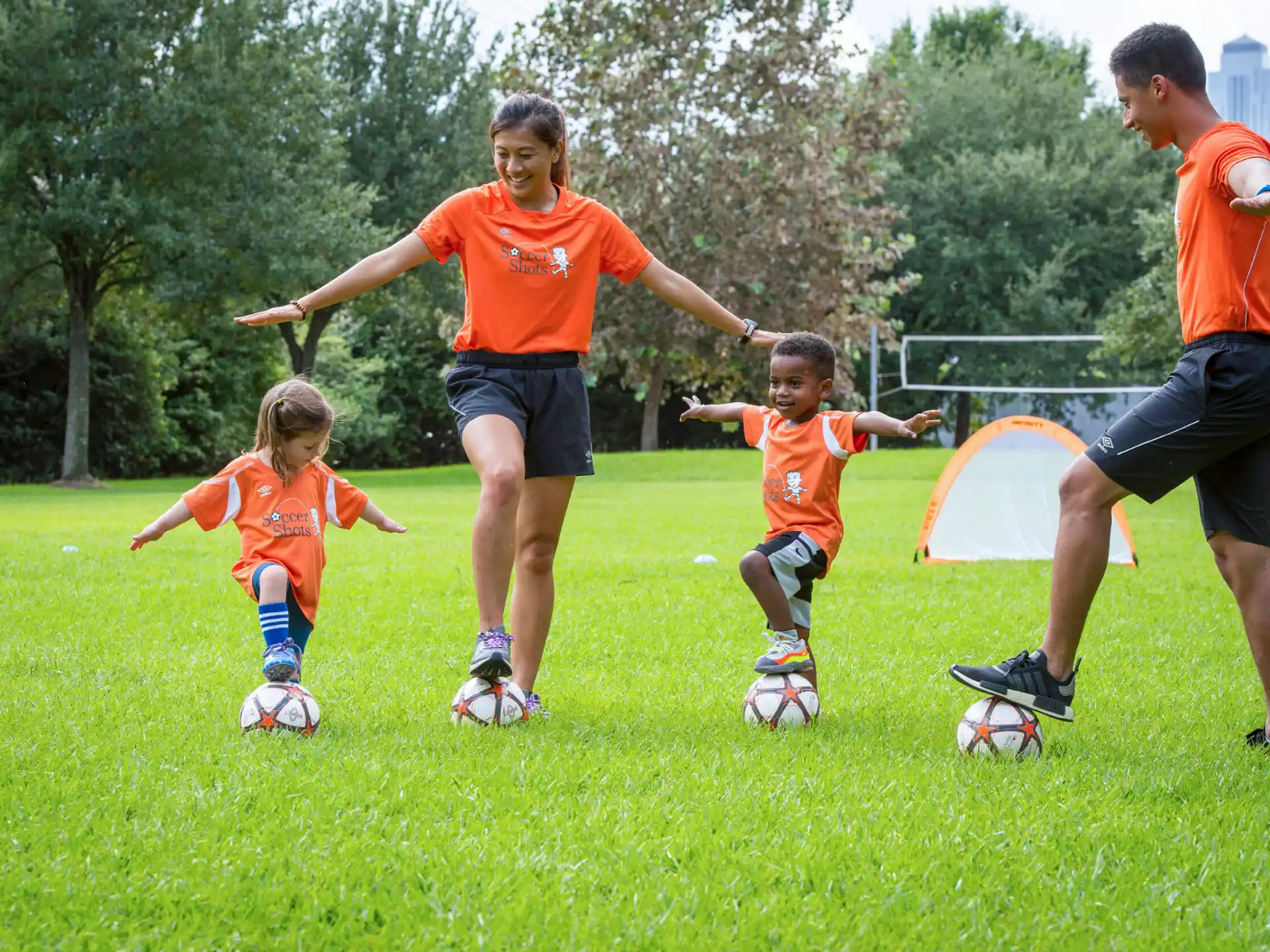 a group of kids playing football