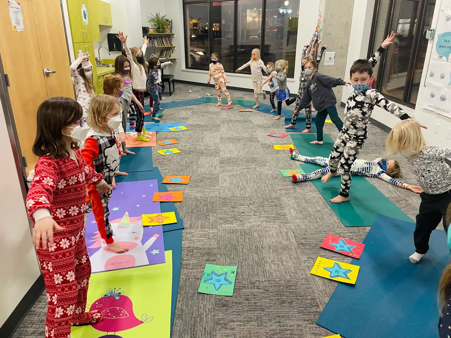 a group of children playing with toys