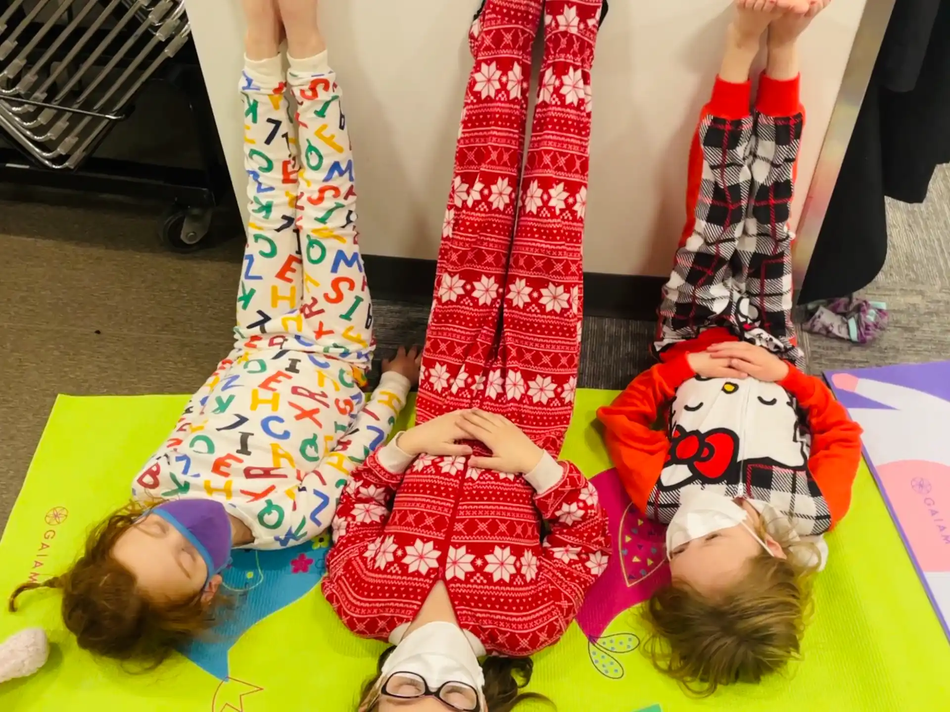 a group of children wearing clothing