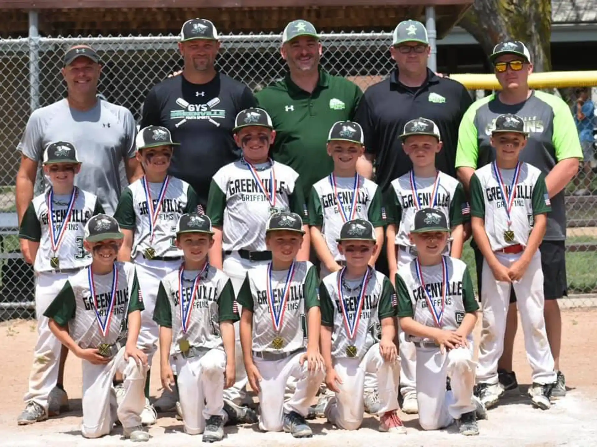 a group of people wearing baseball uniforms