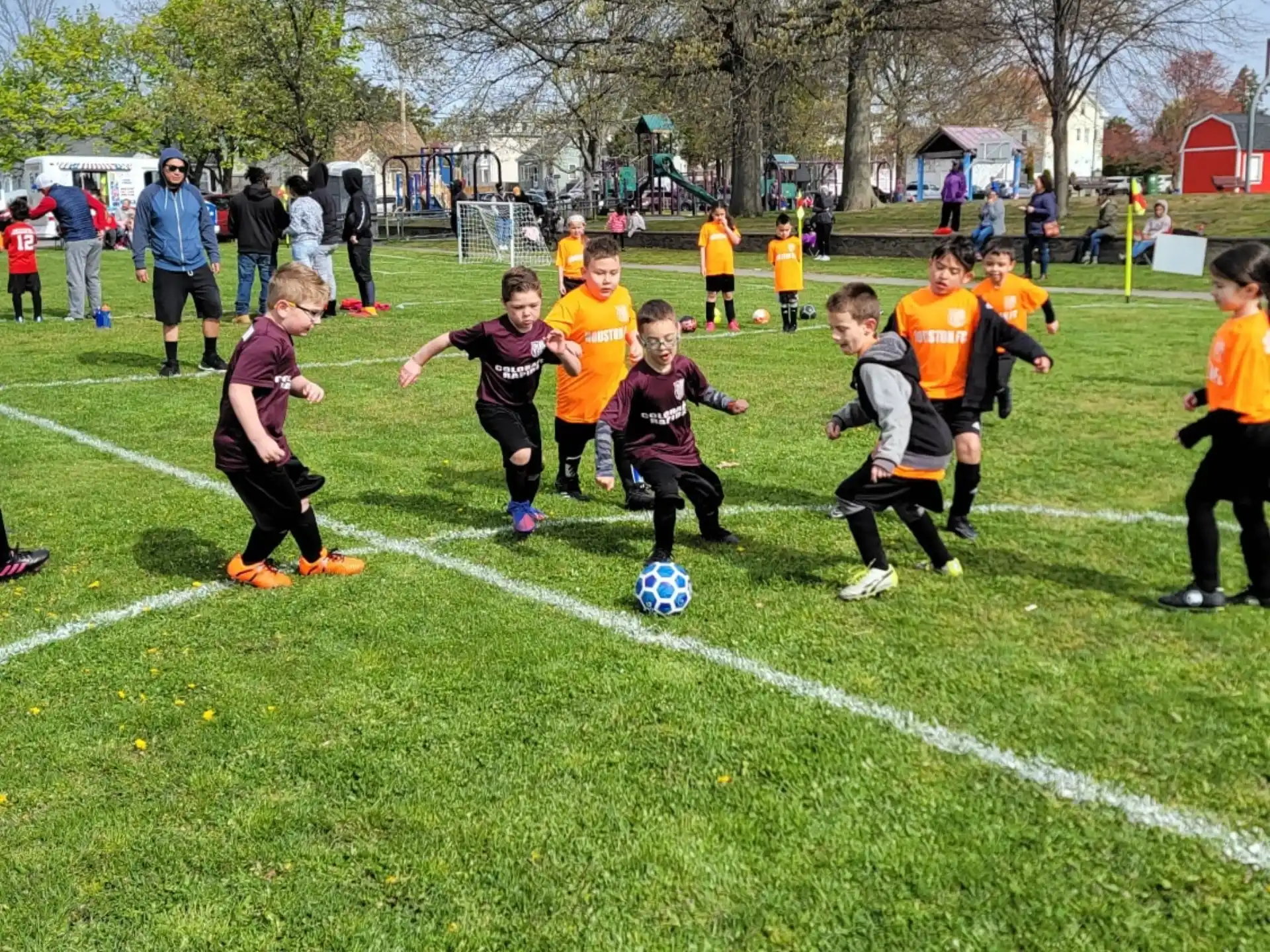 kids playing football on a field