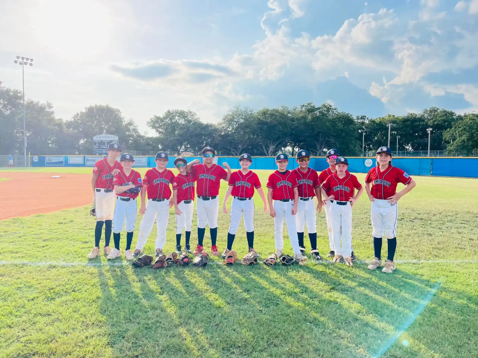 a group of baseball players posing for a photo