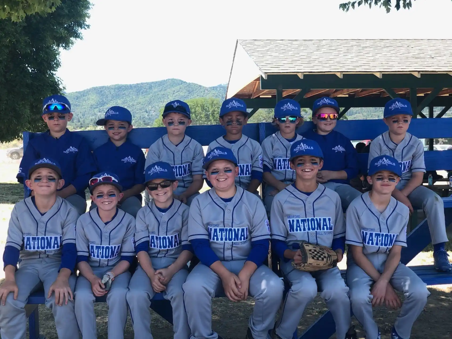 a group of baseball players posing for a photo