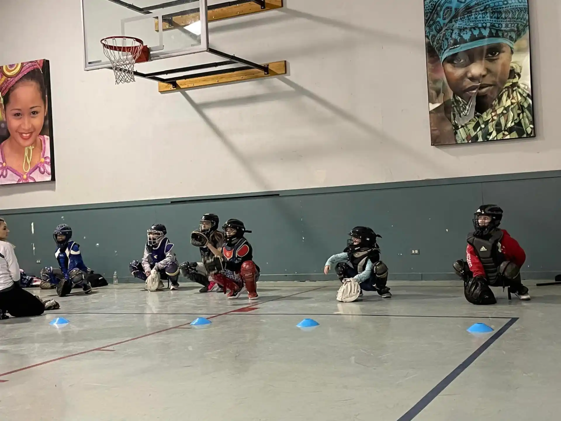 a group of people playing basketball