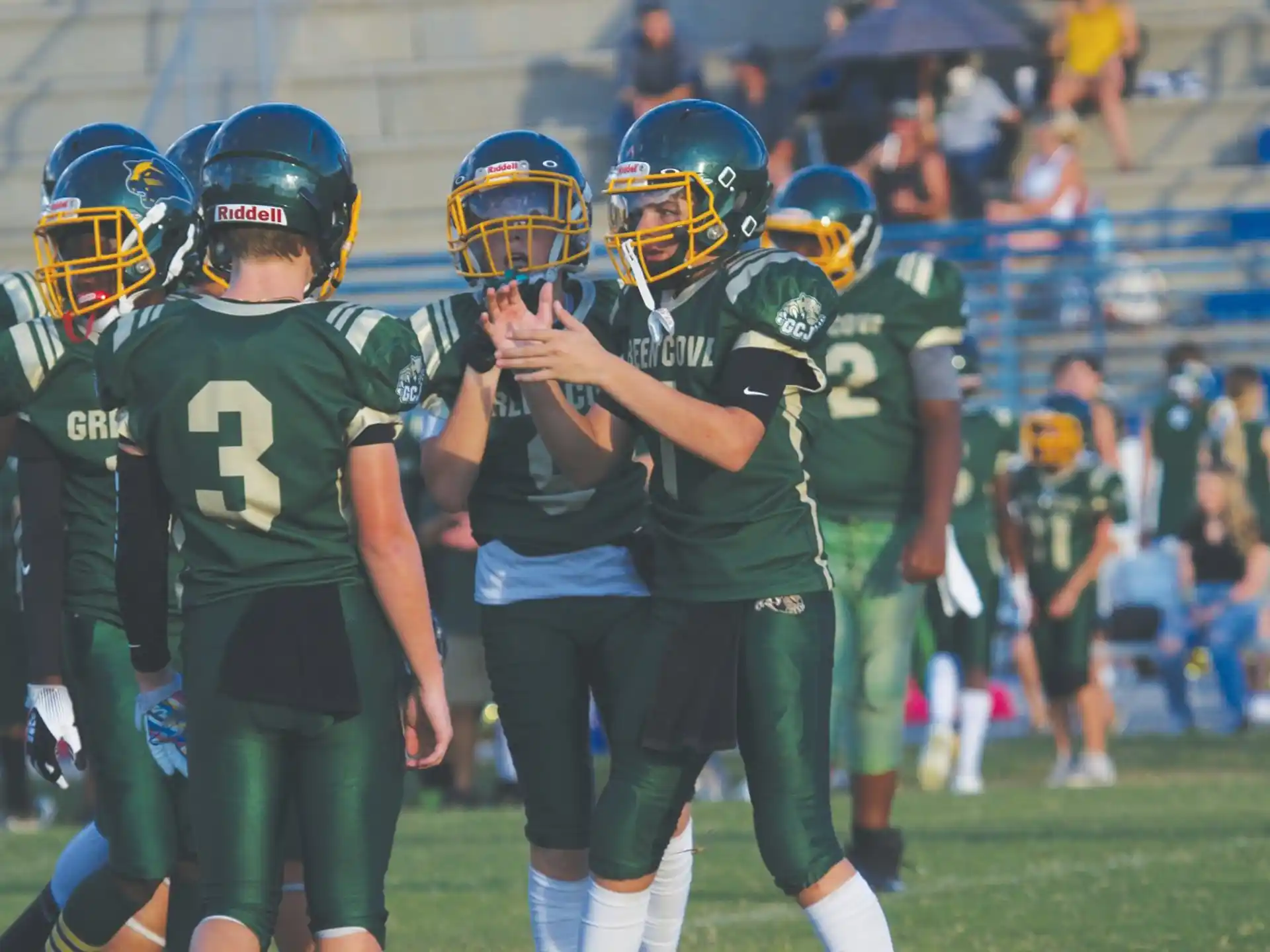 a group of people in football gear