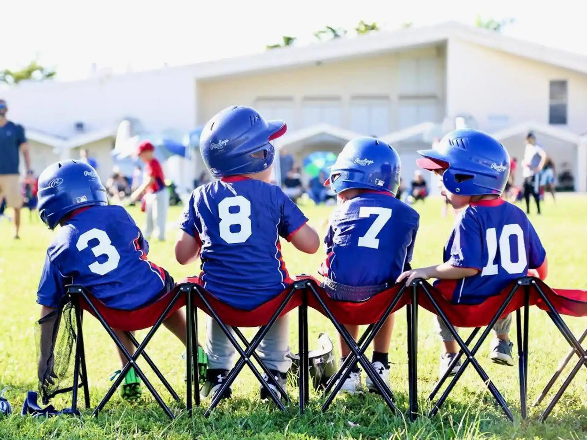 a group of kids wearing helmets