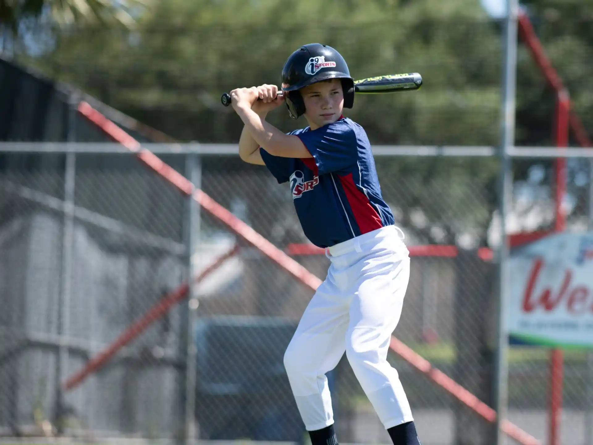 a young boy playing baseball