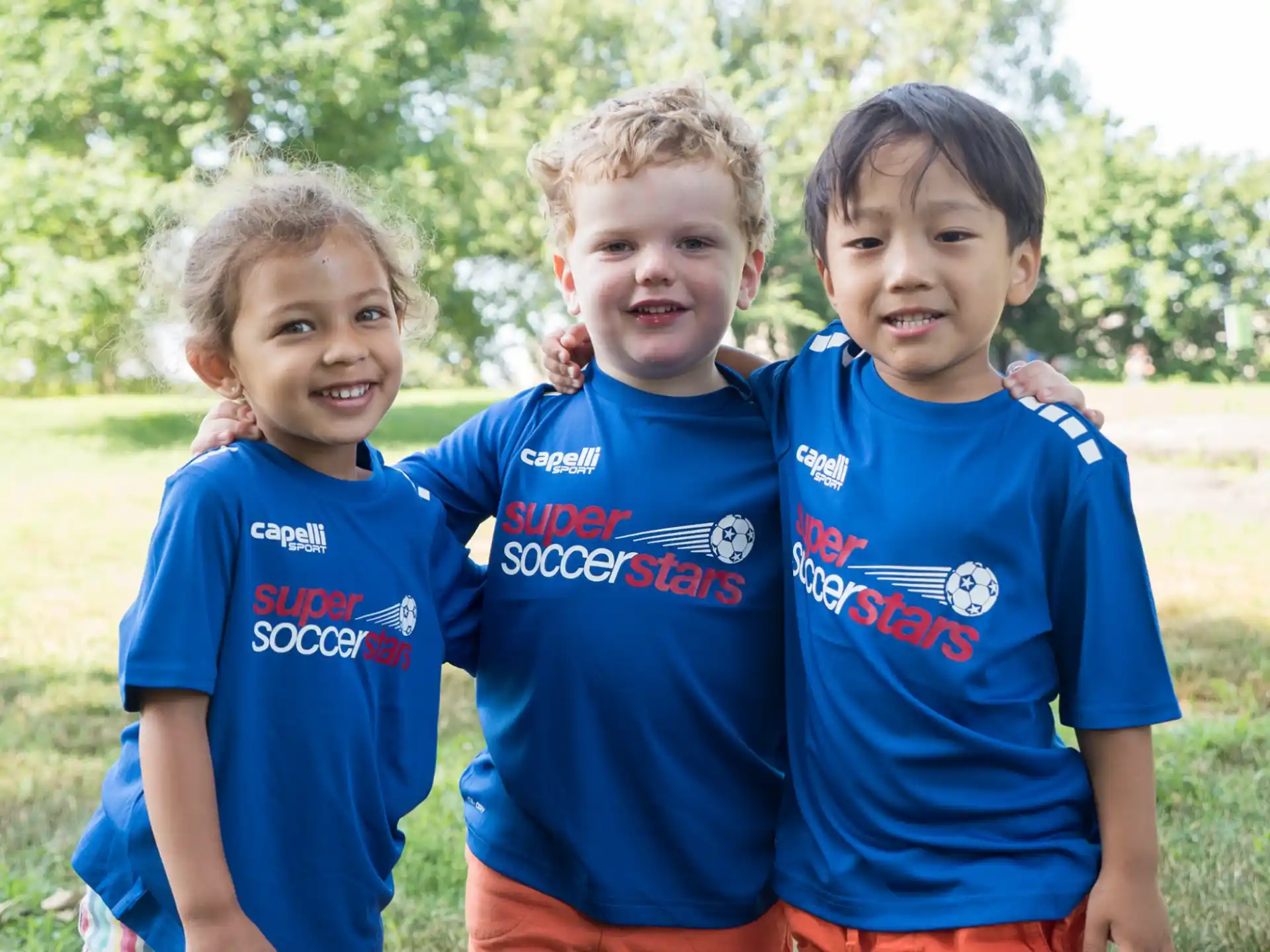a group of boys posing for a picture