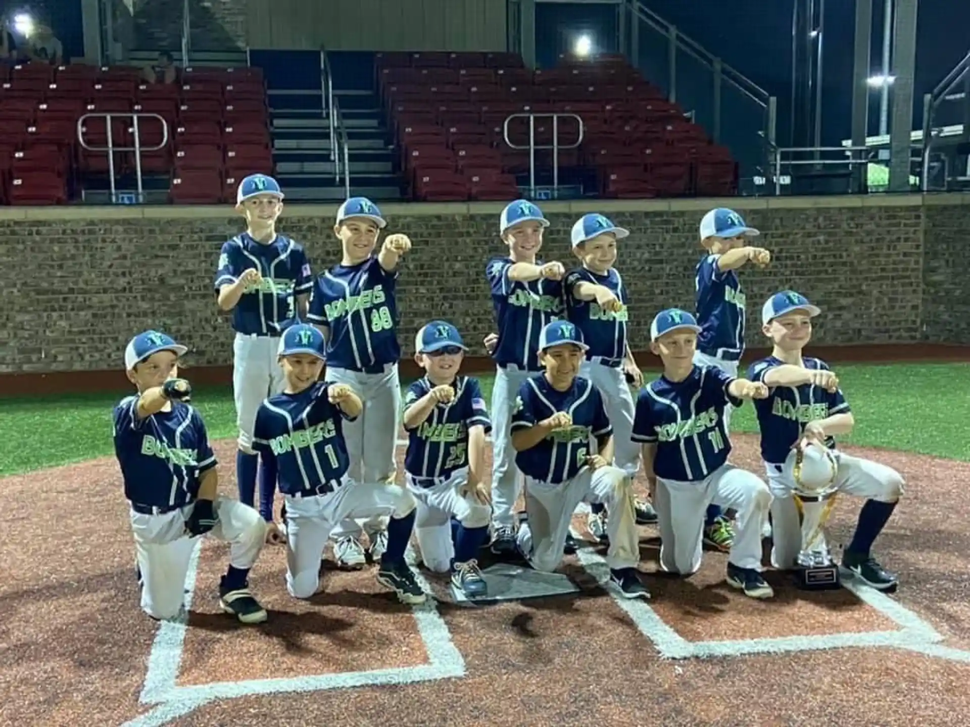 a group of baseball players posing for a photo