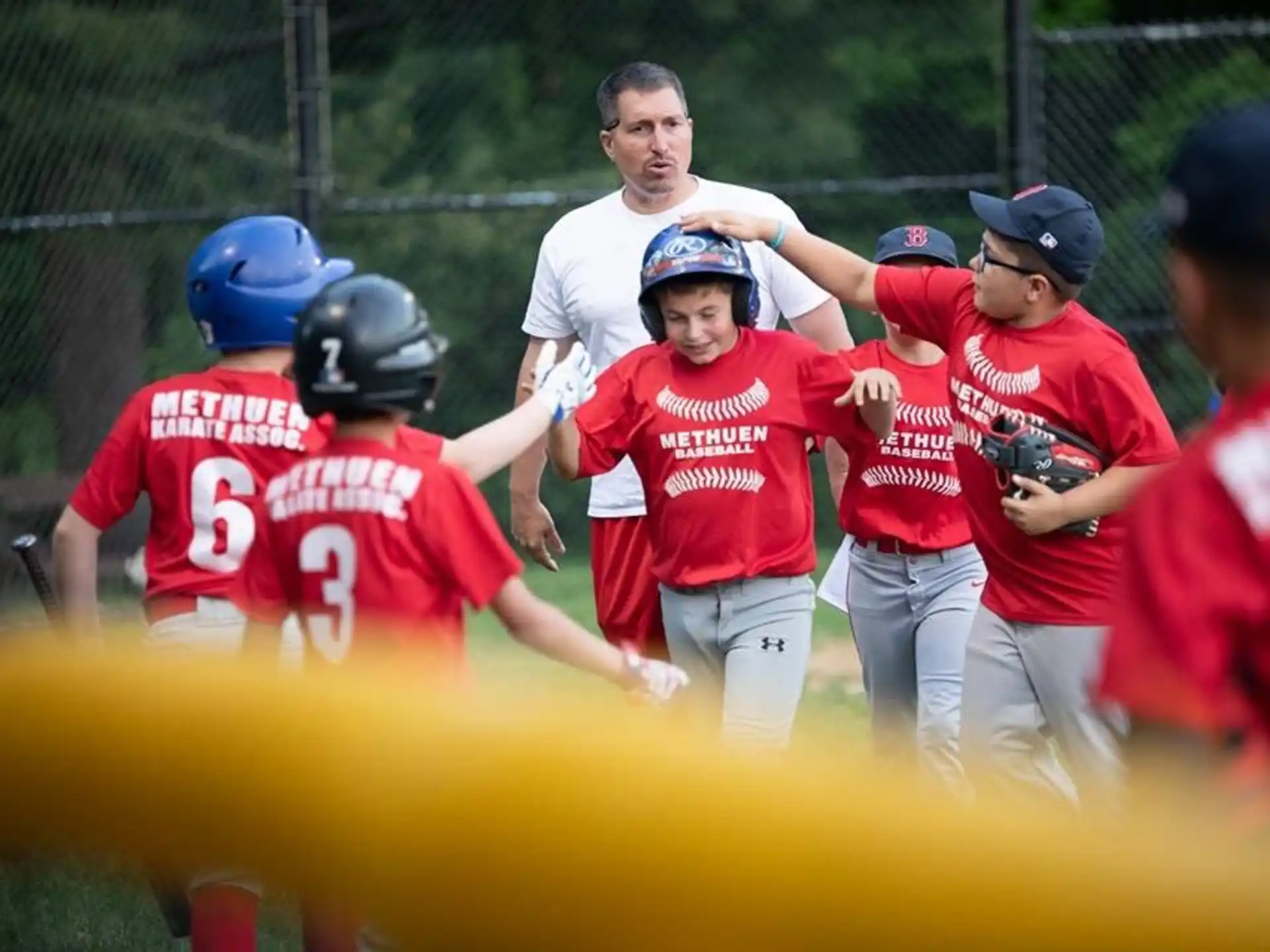 a group of kids playing football
