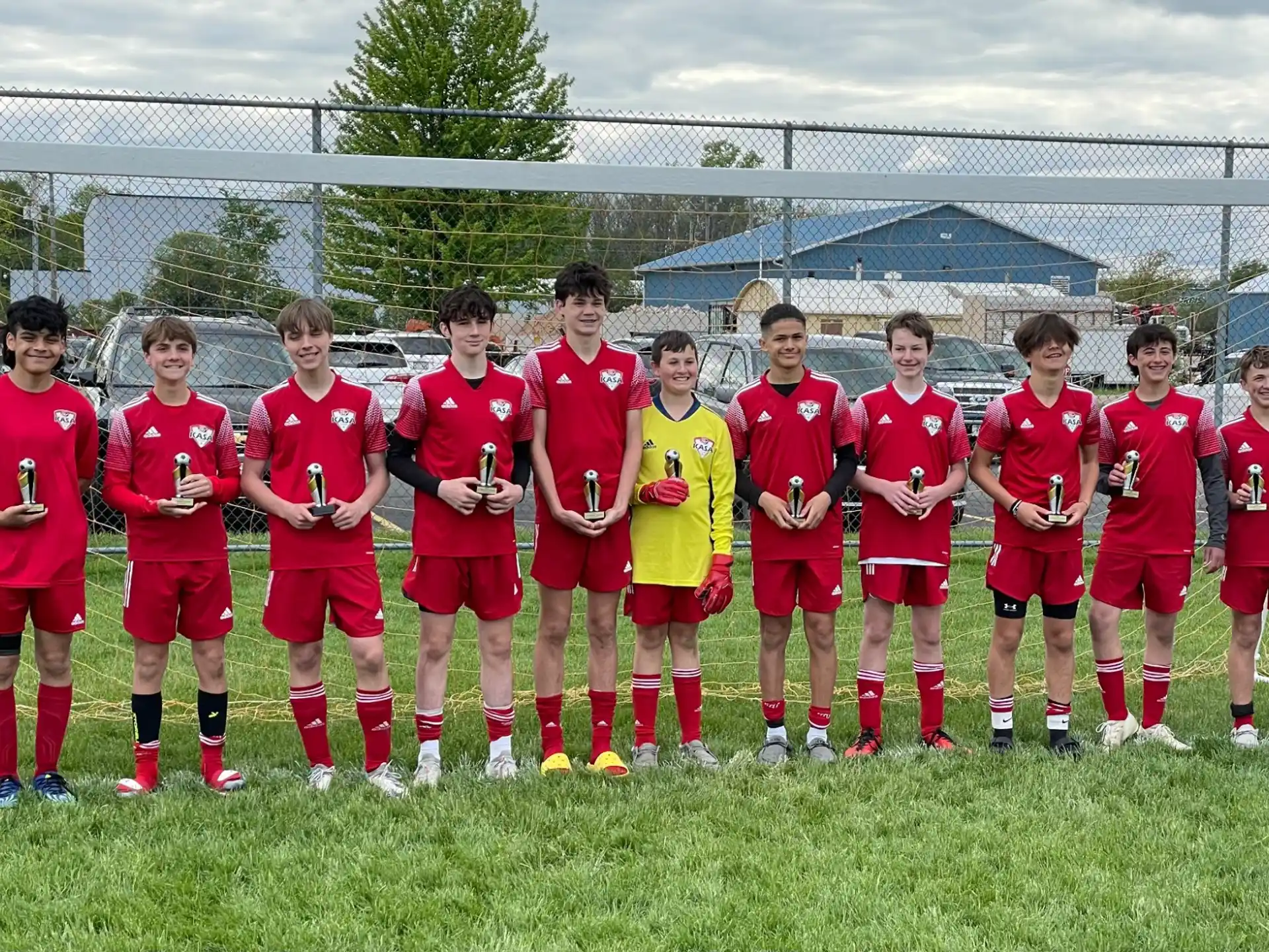a group of football players posing for a photo