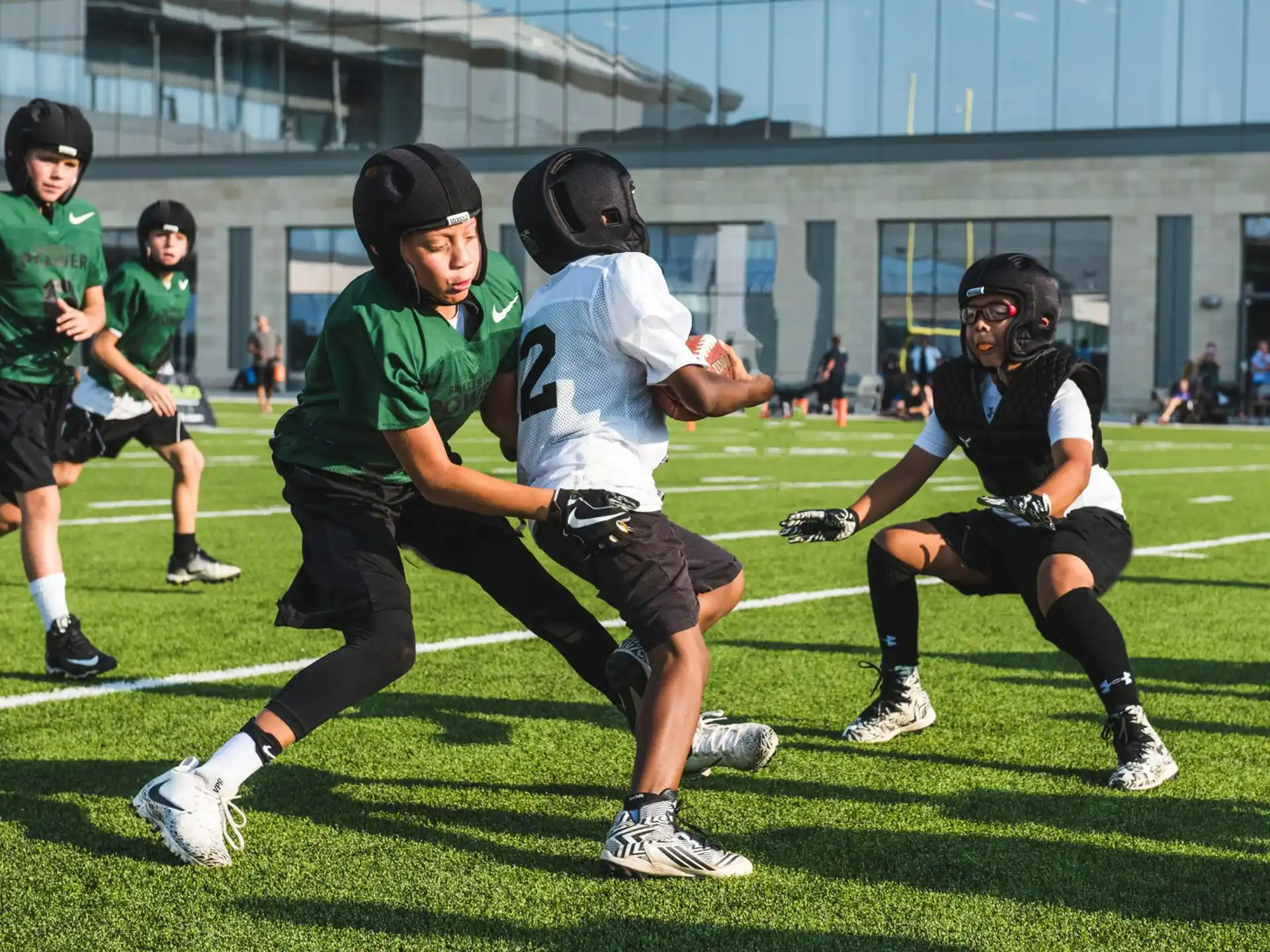 a group of people playing football