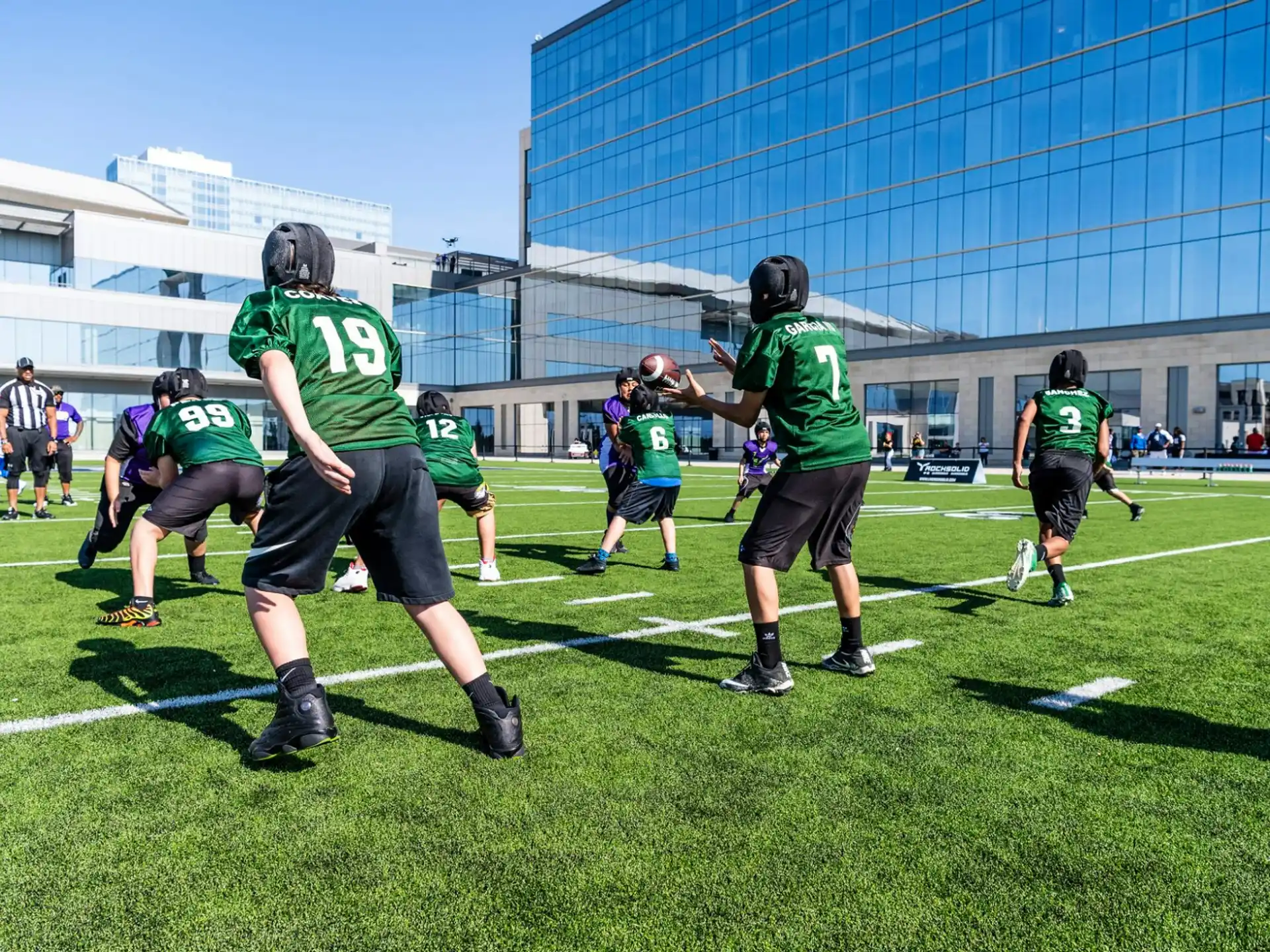 a group of people playing football