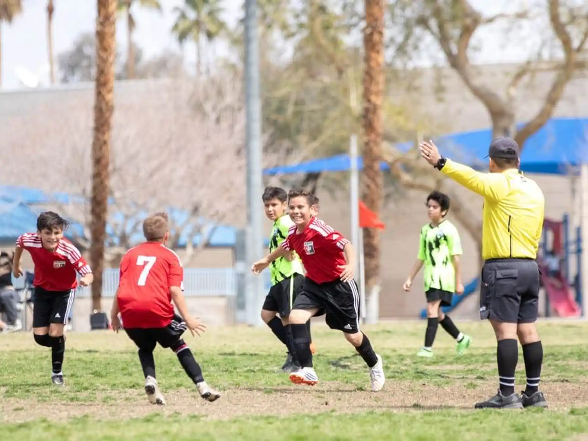 a group of people playing football