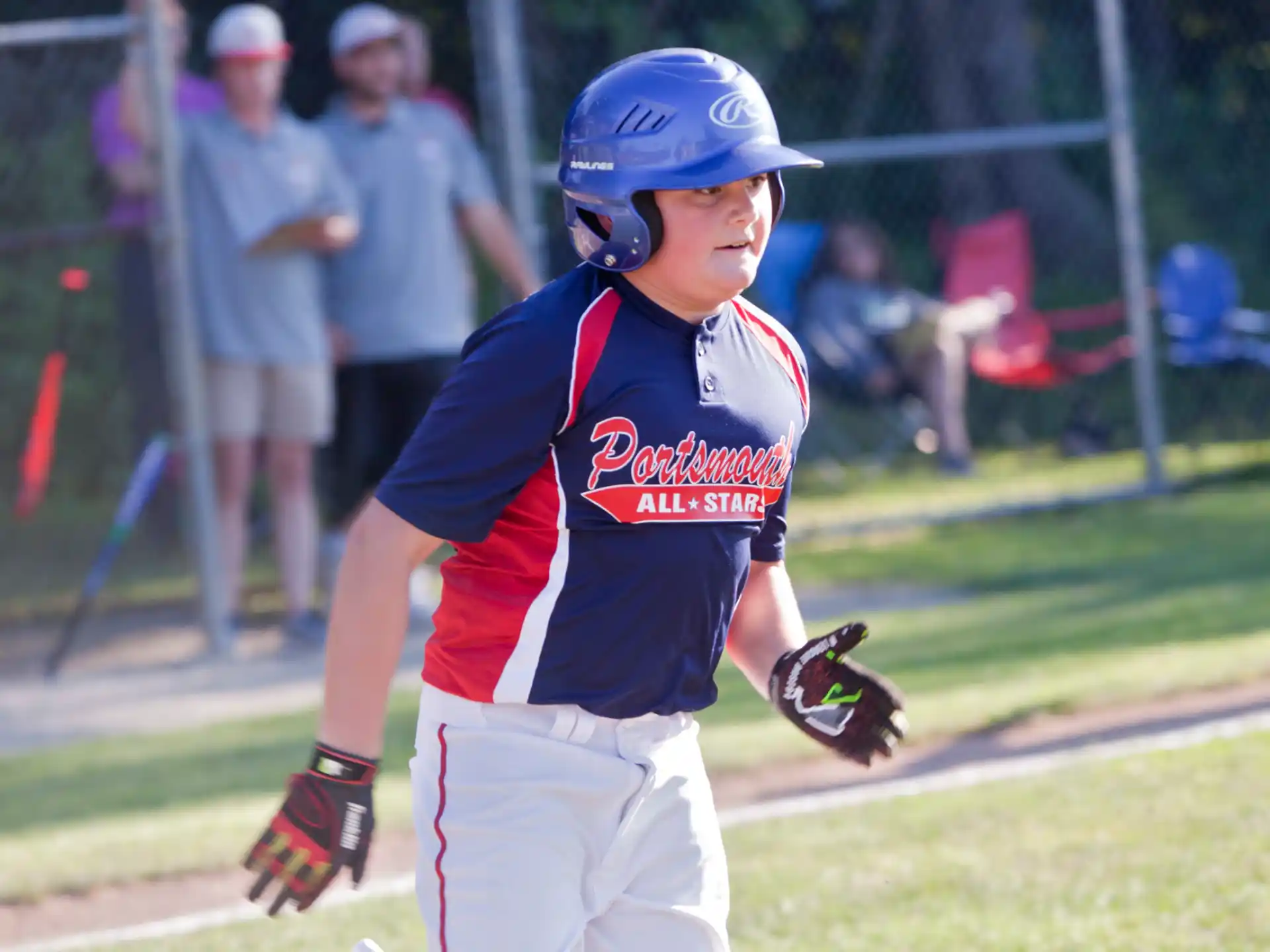 a baseball player in a blue helmet