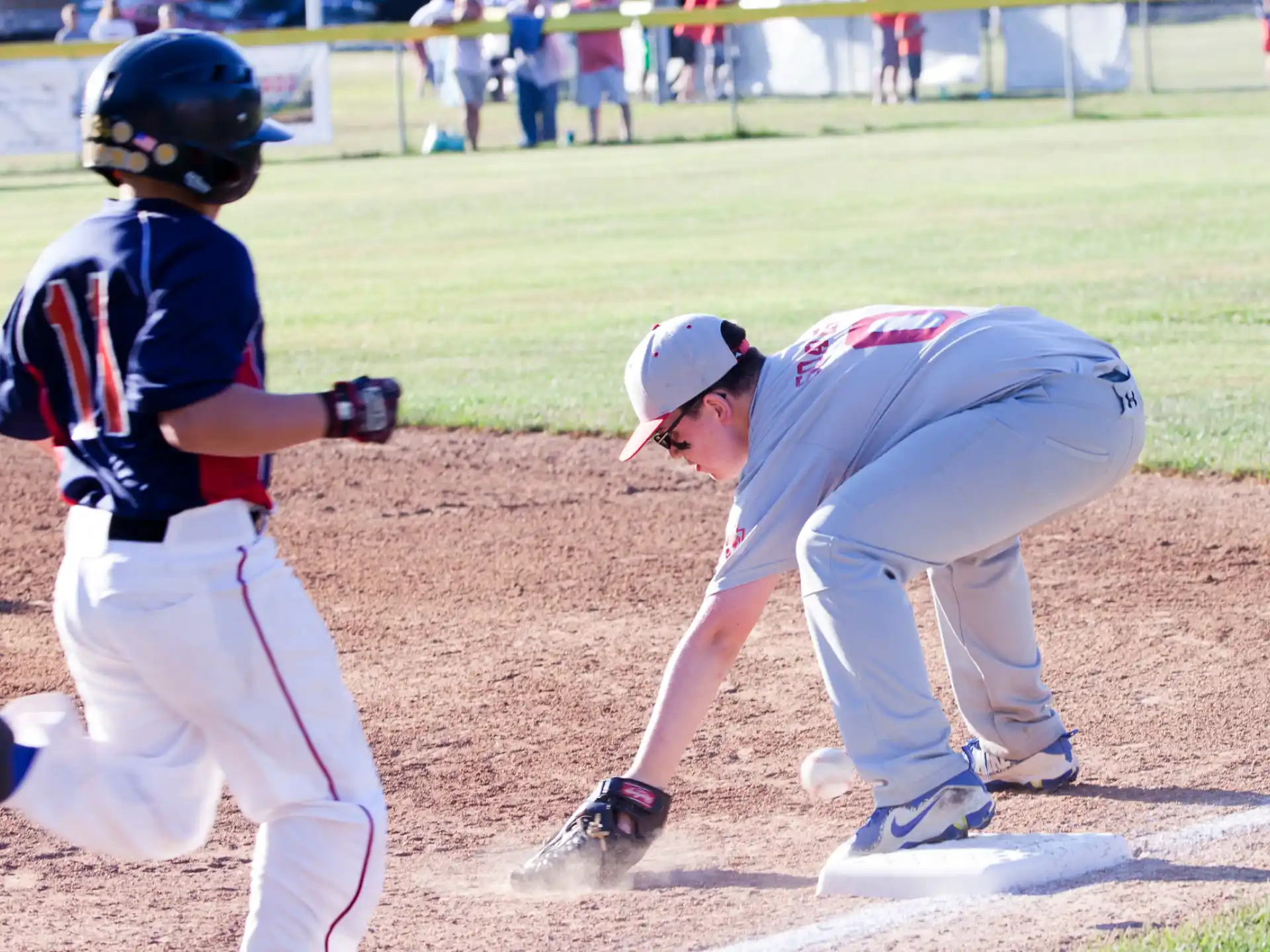 a baseball player sliding into home plate