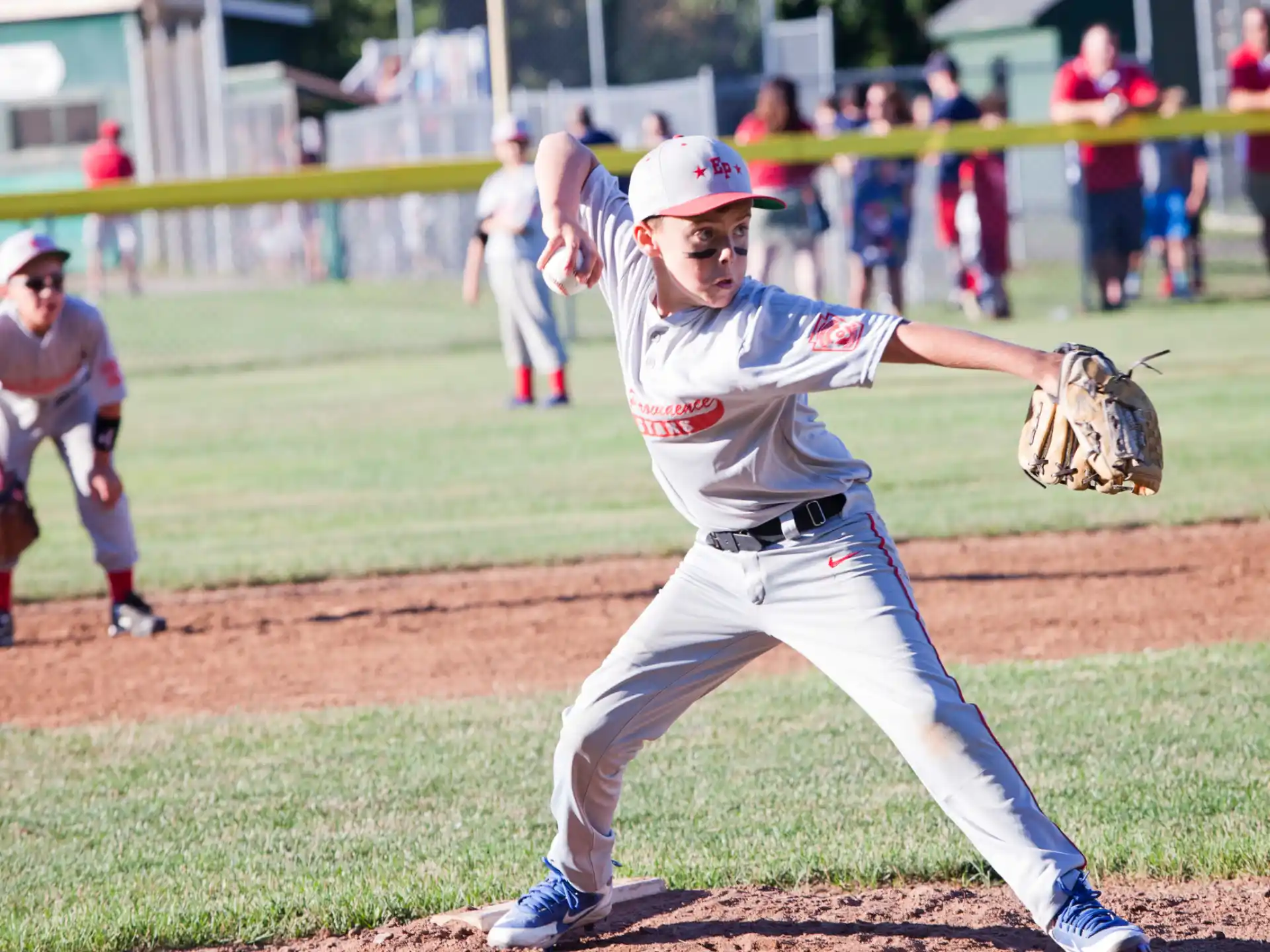 a baseball player throwing a ball