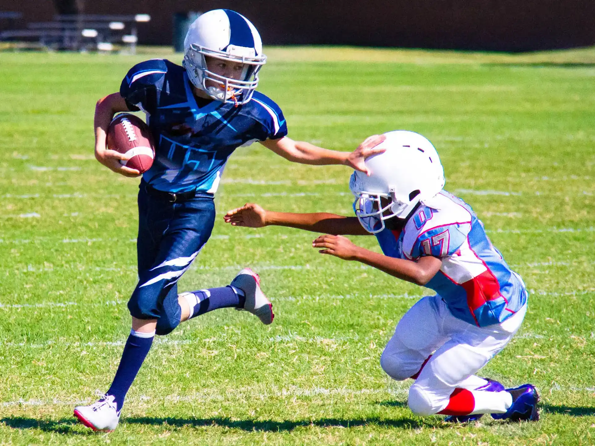 a group of people playing football